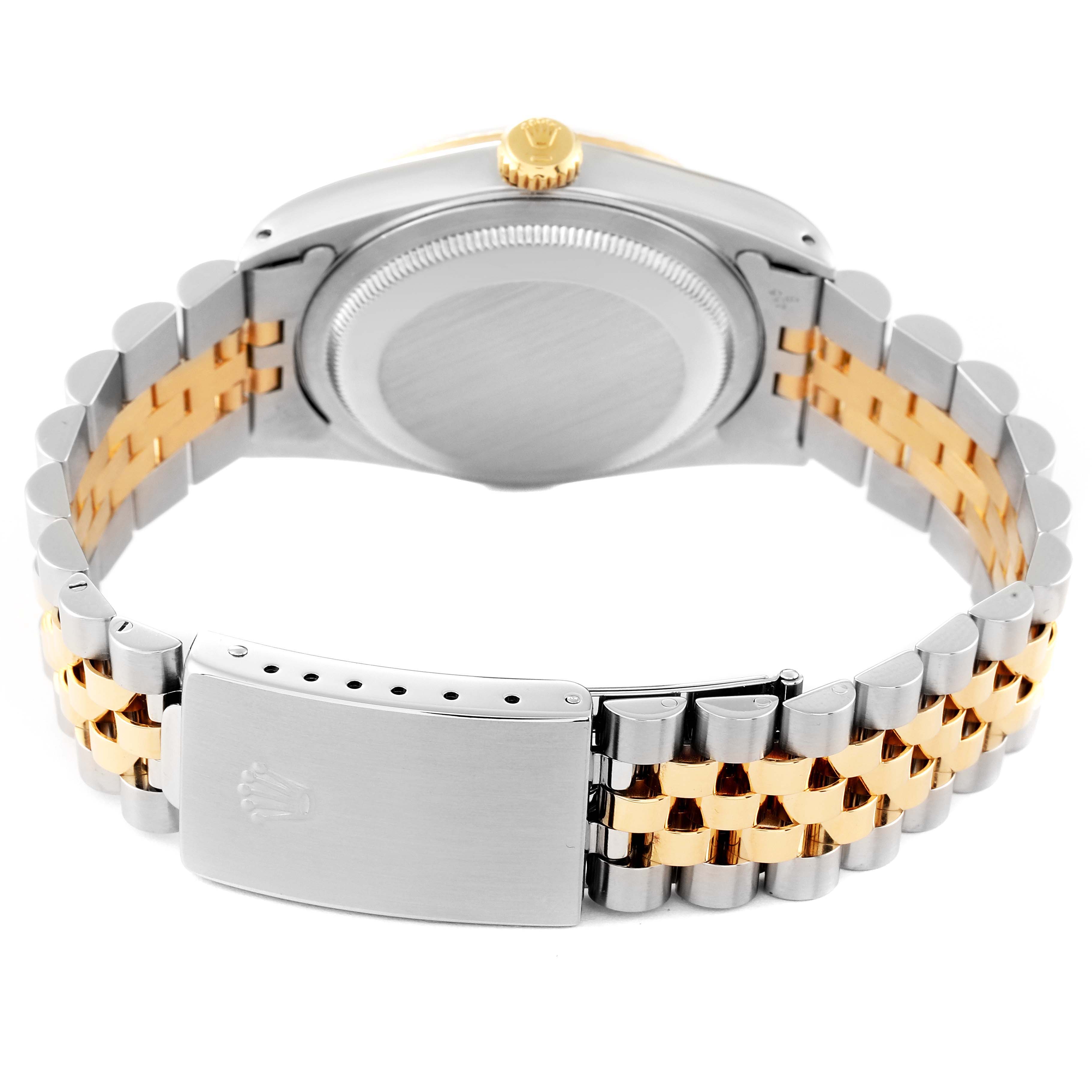 The image shows a back view of a Rolex Datejust 16233 Men's Steel and Gold (two tone) Blue Dial 16233 Men's Steel and Gold (two tone) Blue Dial watch, highlighting the clasp and two-tone bracelet.