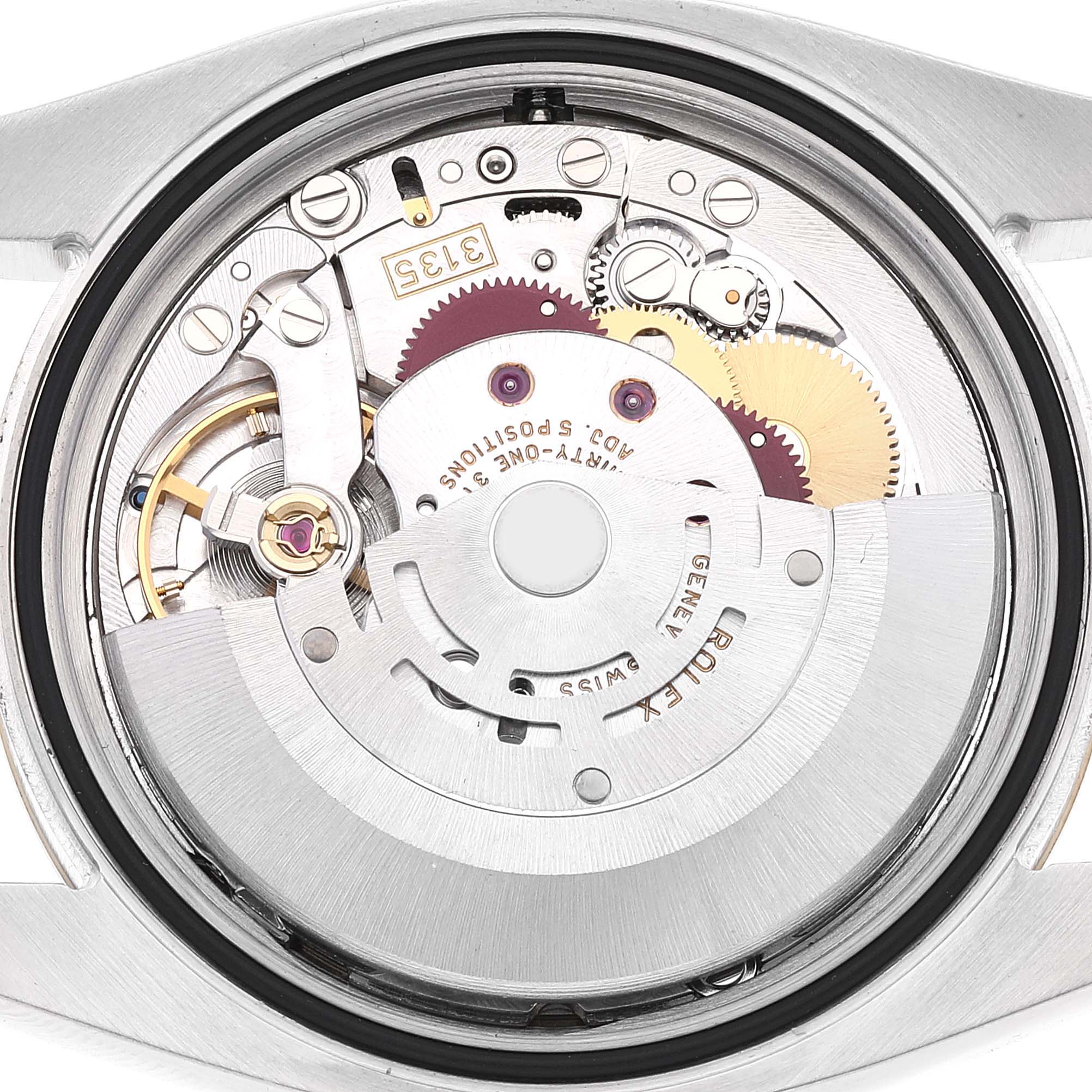 This image shows the movement and internal mechanics of a Rolex Datejust 116233 Men's Steel and Gold (two tone) Champagne Dial 116233 Men's Steel and Gold (two tone) Champagne Dial watch from the back angle.