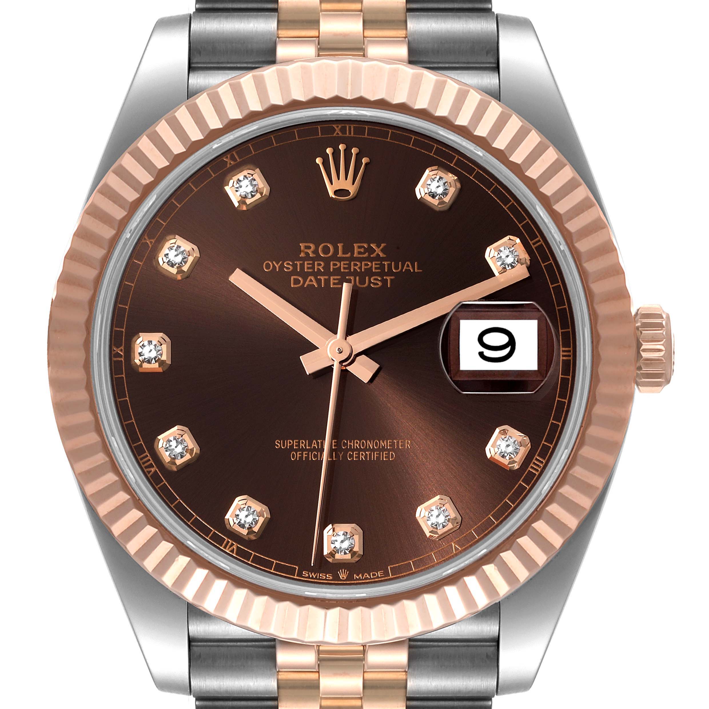 The image shows a close-up frontal view of a Rolex Datejust 41 126331 Men
s Steel and Gold (two tone) Brown Dial 126331 Men
s Steel and Gold (two tone) Brown Dial watch, highlighting its dial, bezel, and part of the bracelet.