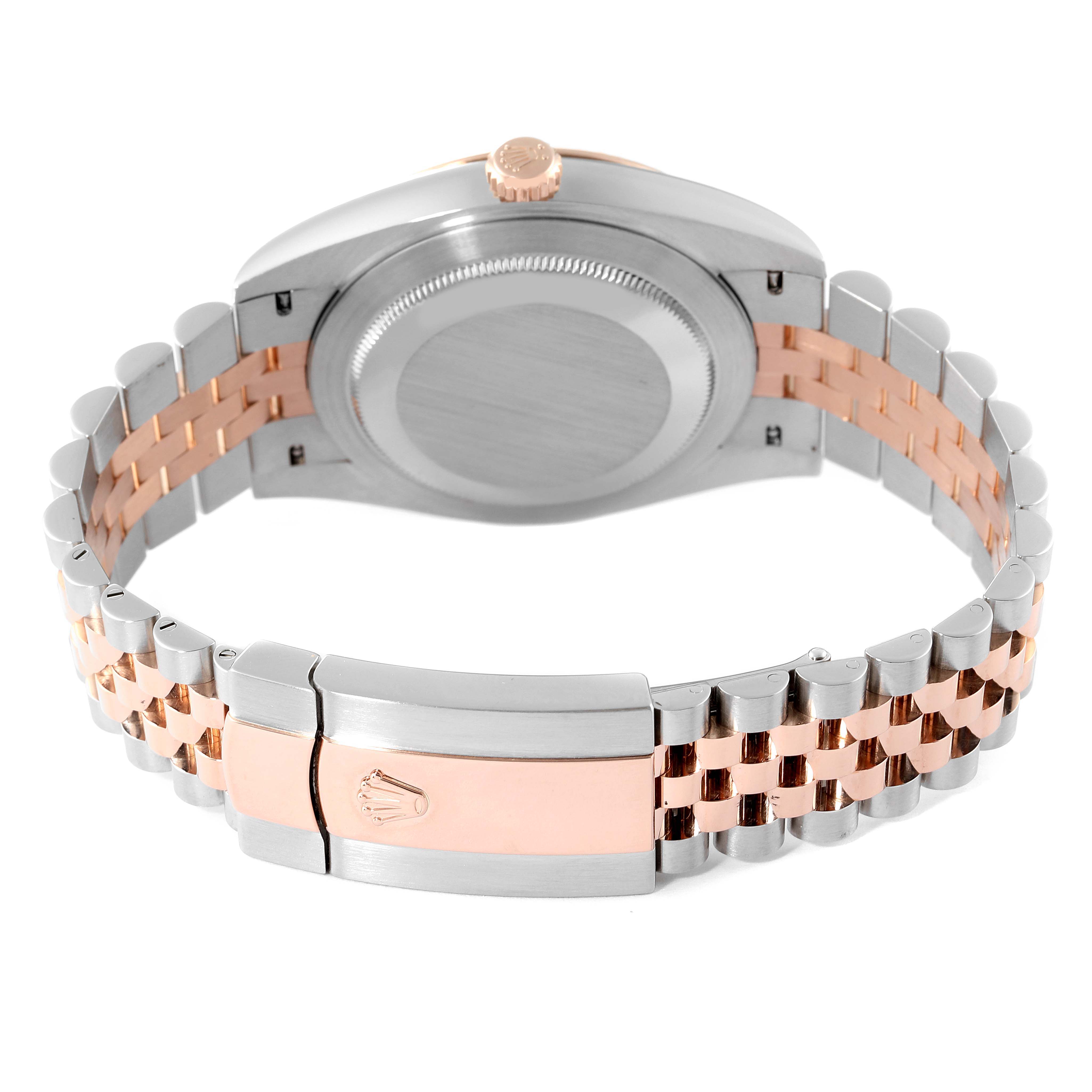 The image shows the back and bracelet of a Rolex Datejust 41 126331 Men
s Steel and Gold (two tone) Brown Dial 126331 Men
s Steel and Gold (two tone) Brown Dial watch, highlighting a two-tone metal design and the clasp.