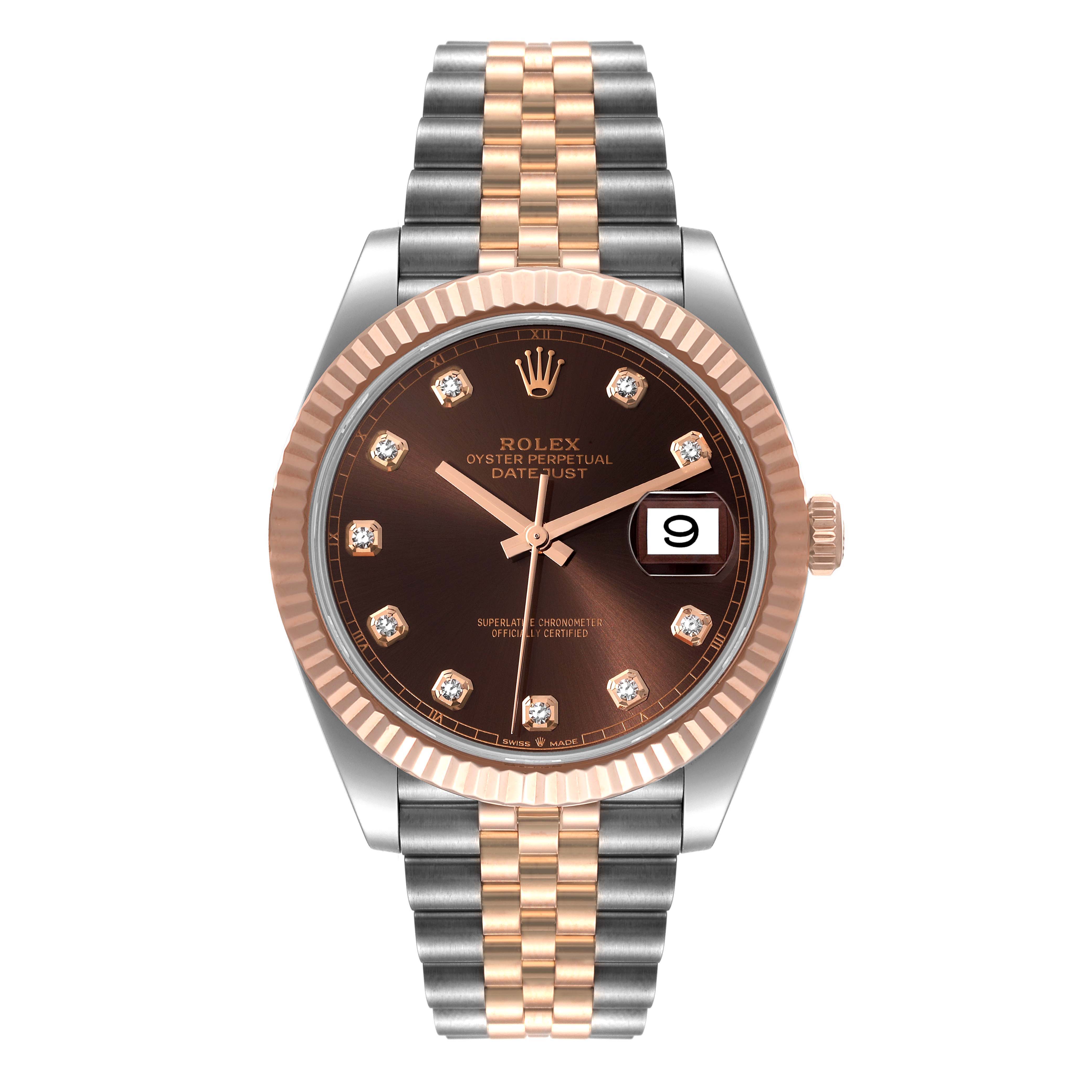 The image shows a front view of a Rolex Datejust 41 126331 Men
s Steel and Gold (two tone) Brown Dial 126331 Men
s Steel and Gold (two tone) Brown Dial watch, highlighting its two-tone bracelet, fluted bezel, and date display.