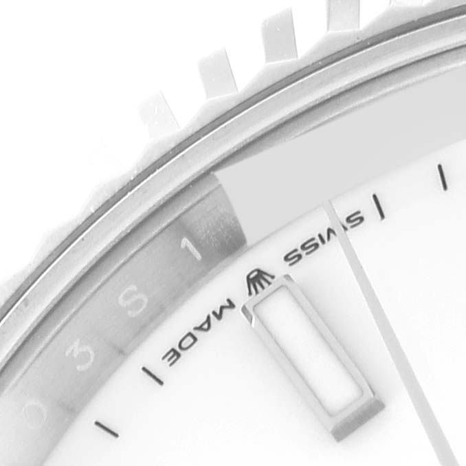 The image shows a close-up of the dial and bezel of the Rolex Datejust 41 126334 Men's Stainless Steel White Dial 126334 Men's Stainless Steel White Dial watch, highlighting the "Swiss Made" text and part of the hour marker.