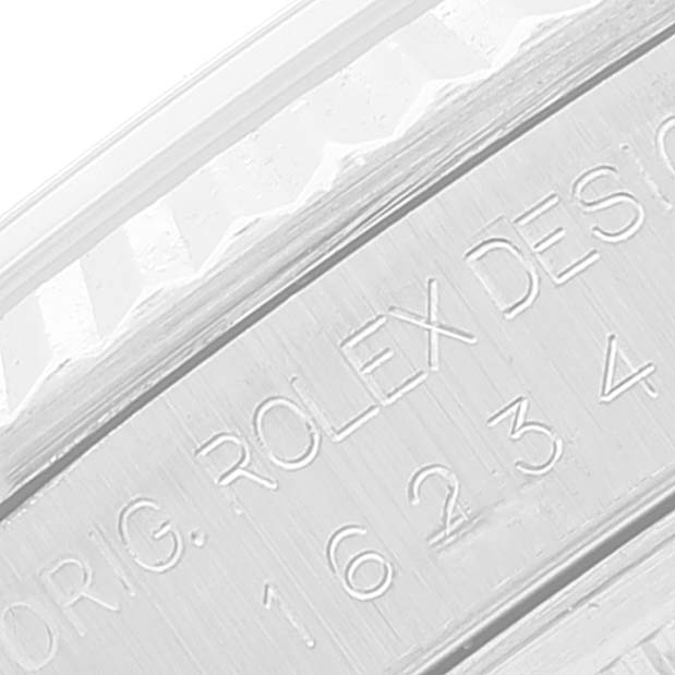 The image shows a close-up of the engraved bezel of a Rolex Datejust 16234 Men's Stainless Steel Blue Dial 16234 Men's Stainless Steel Blue Dial watch, focusing on the text and numbers.