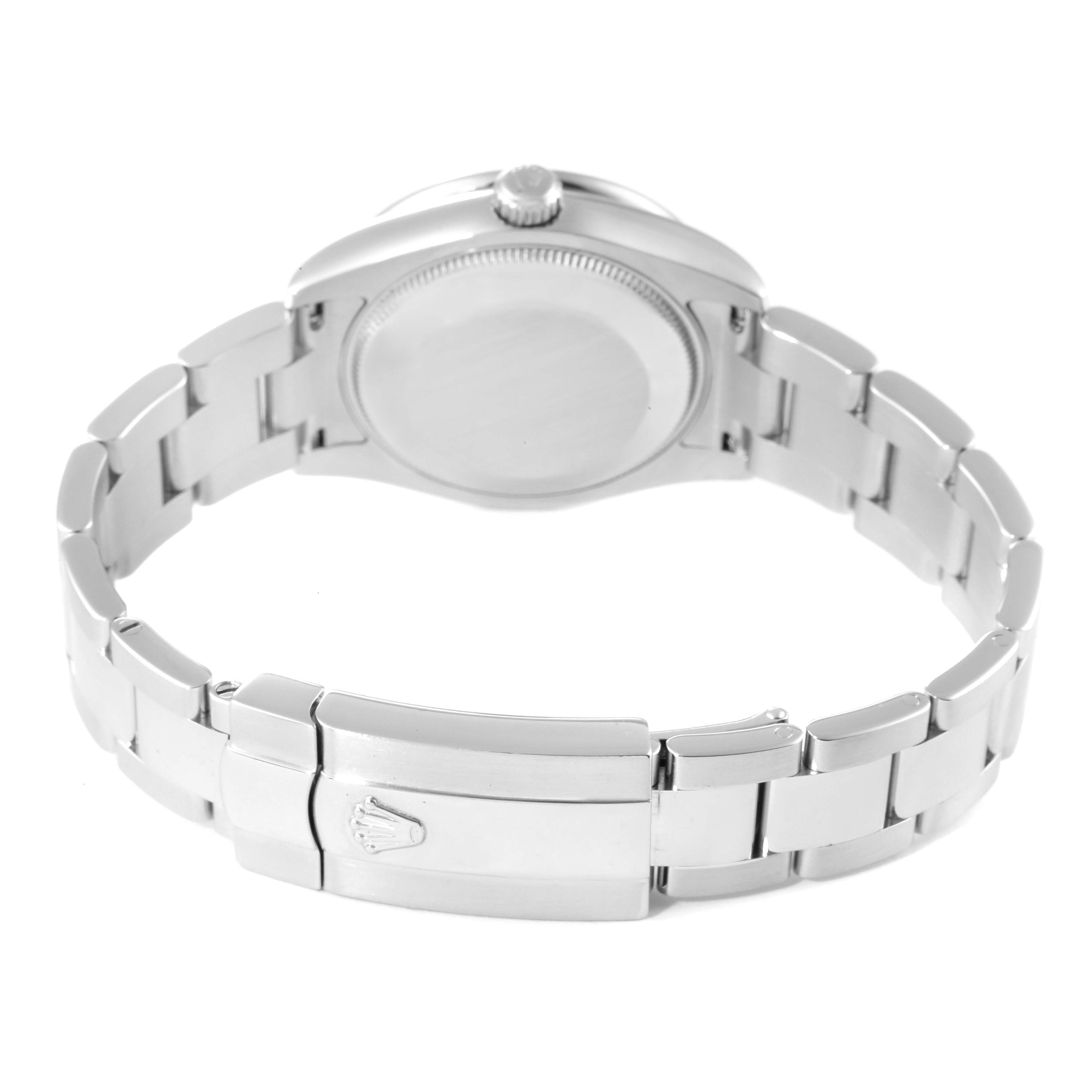 This image shows the back view of a Mid-Size Rolex watch, highlighting its case back and metal bracelet with clasp.