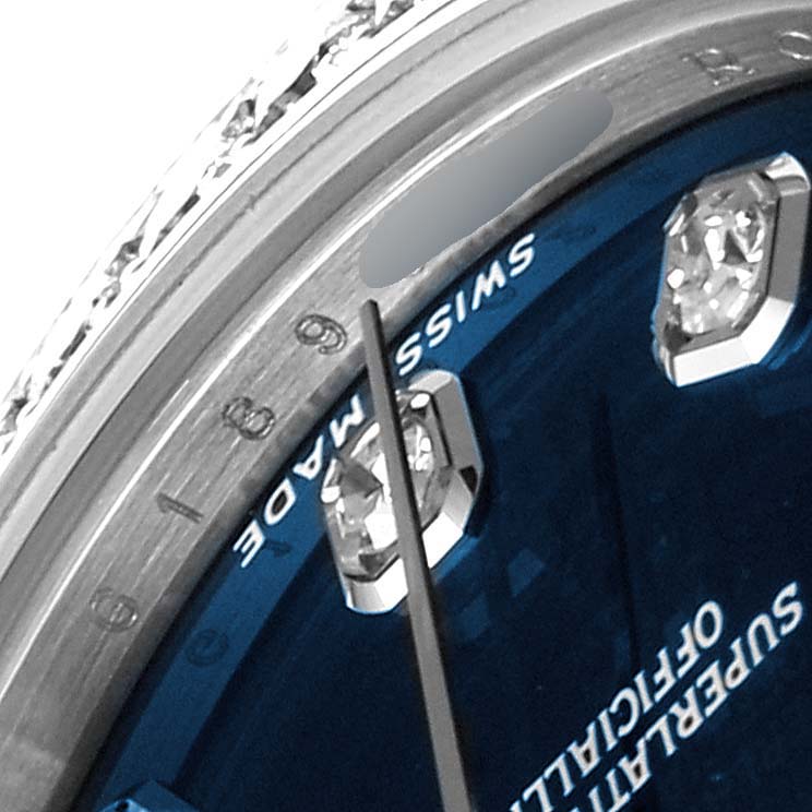 The image shows a close-up of the dial and bezel of a Mid-Size Rolex watch, highlighting the "SWISS MADE" text and diamond hour markers.