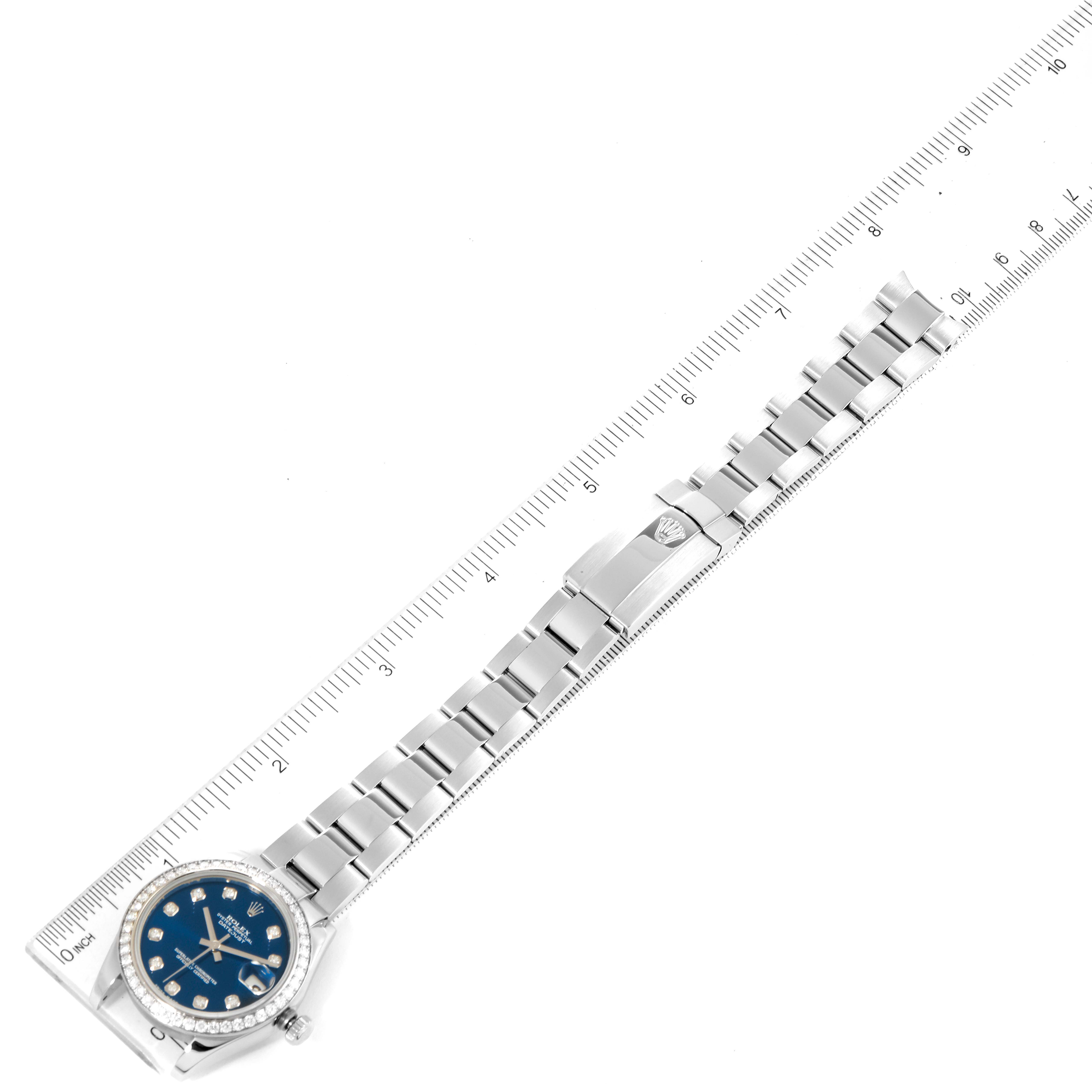 The Rolex Mid-Size 178384 Women's Stainless Steel Blue Dial 178384 Women's Stainless Steel Blue Dial watch is shown from a top-down angle, displaying its full length, including the bracelet and clasp.