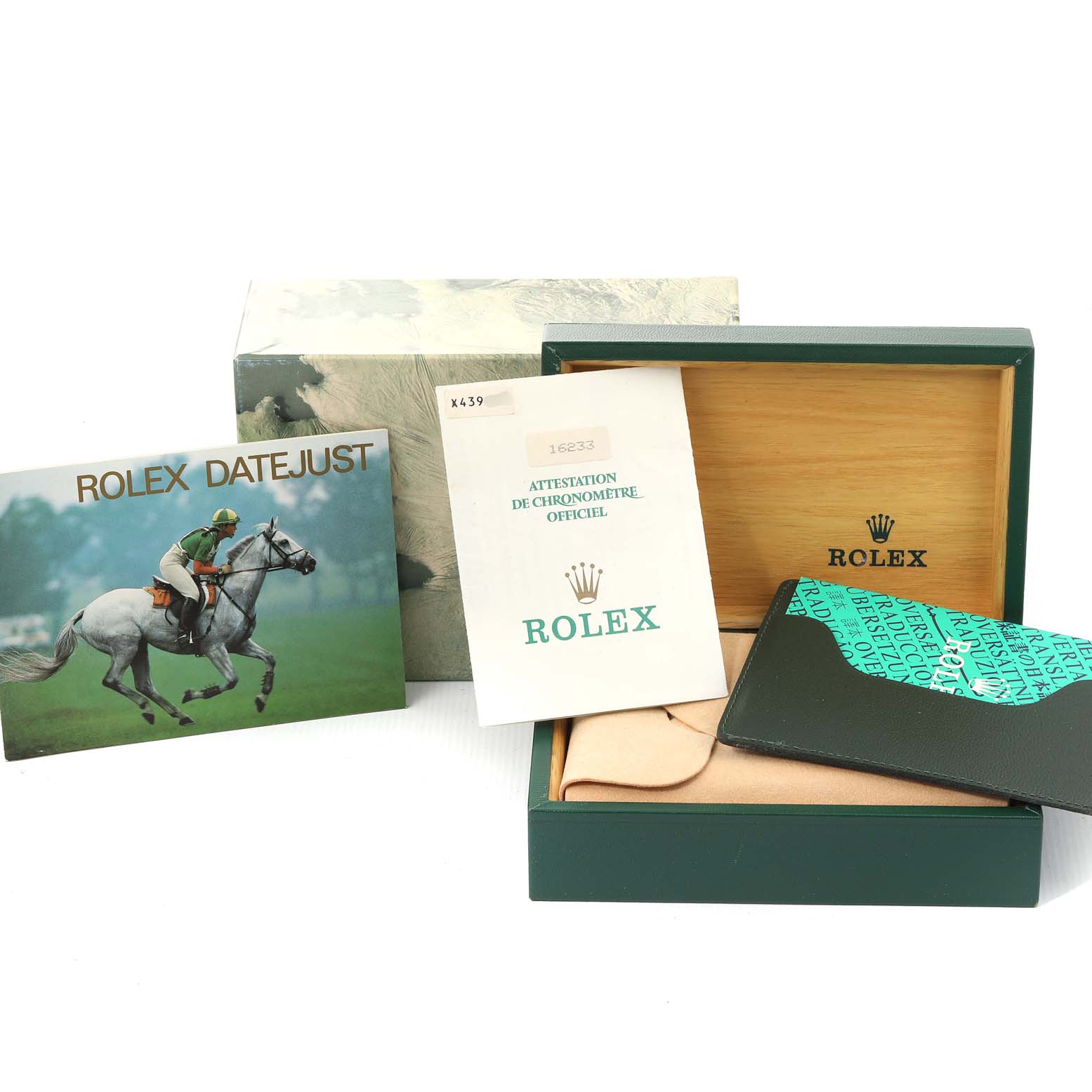 The image shows a Rolex Datejust 16233 Men's Steel and Gold (two tone) Champagne Dial 16233 Men's Steel and Gold (two tone) Champagne Dial box, warranty documents, a Rolex booklet, and a card holder.