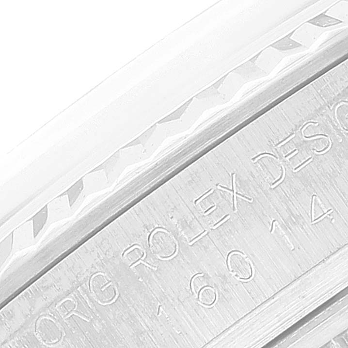 This close-up image shows the engraved side of the Vintage Collection watch by Rolex, including the model number and design details. 