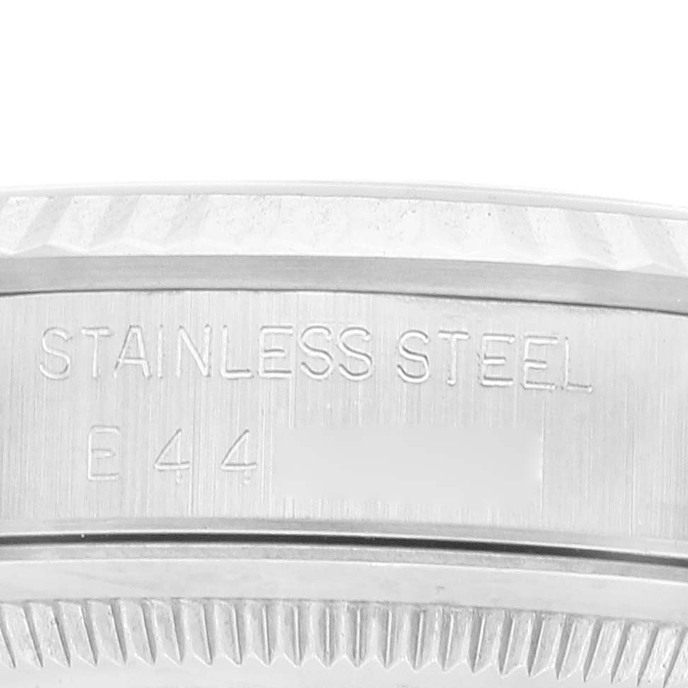 This image shows a close-up of the stainless steel case and serial number engraving on a Rolex Datejust 16234 Men's Stainless Steel Silver Dial 16234 Men's Stainless Steel Silver Dial watch.