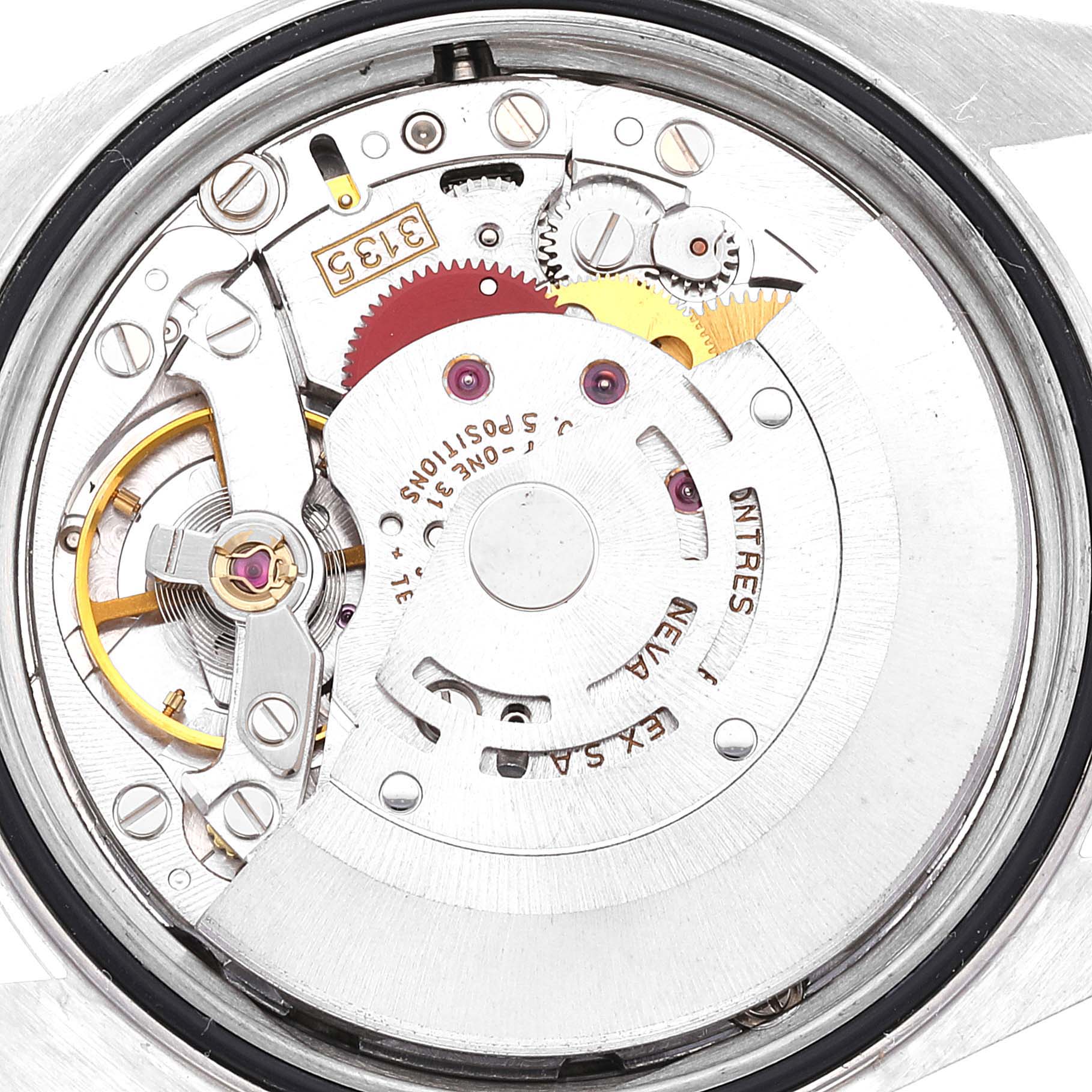 This image shows a close-up view of the movement inside a Rolex Datejust 16234 Men's Stainless Steel Silver Dial 16234 Men's Stainless Steel Silver Dial watch from the back, highlighting the intricate gears and components.