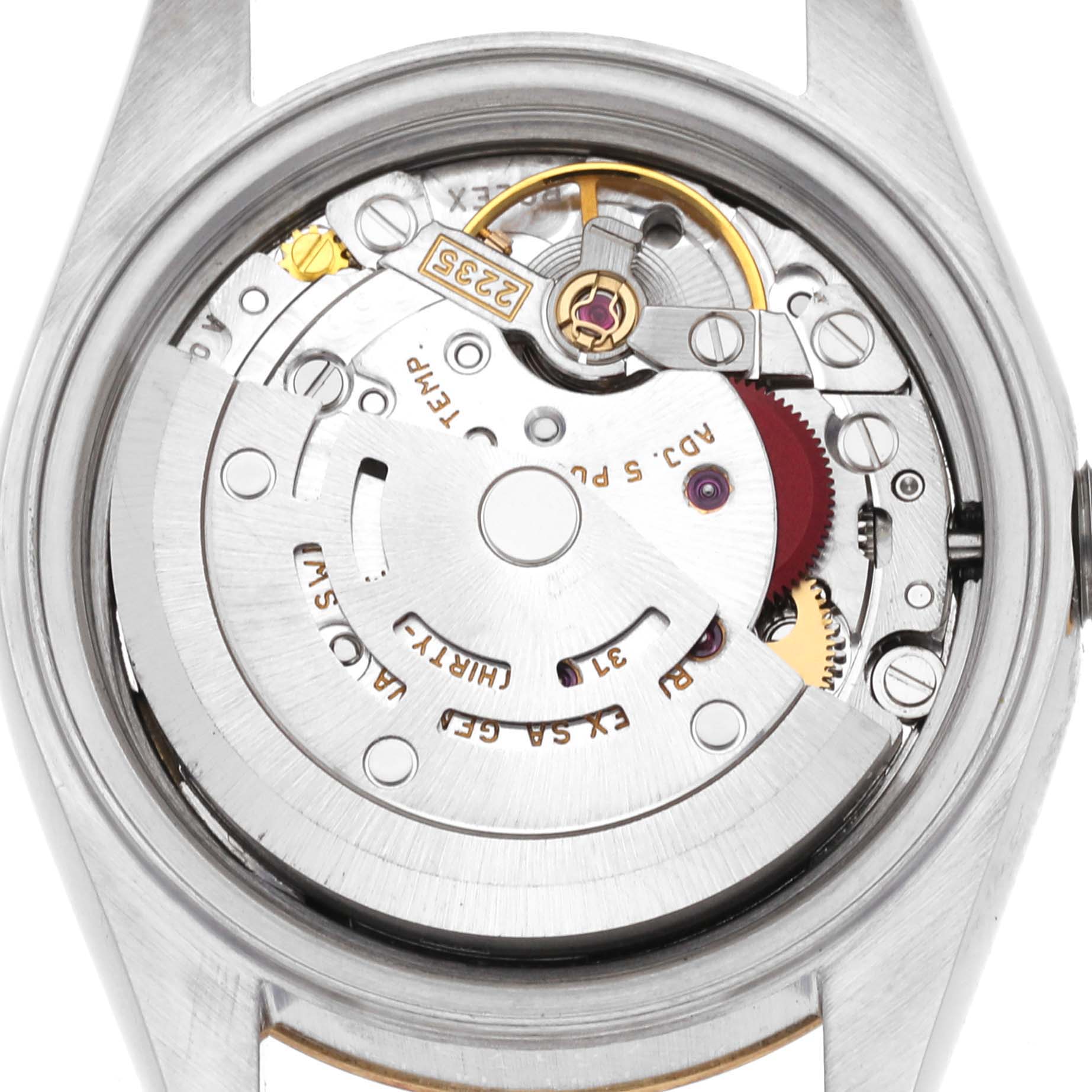 This image shows the back of a Rolex Datejust 79173 Women's Steel and Gold (two tone) Champagne Dial 79173 Women's Steel and Gold (two tone) Champagne Dial watch, revealing its intricate internal movement and mechanism.