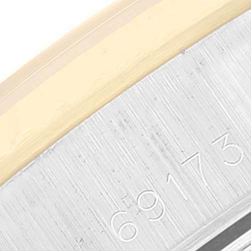 This image shows a close-up of the bezel and case details, including the reference number "69173" of a Rolex Datejust 69173 Women's Steel and Gold (two tone) Champagne Dial 69173 Women's Steel and Gold (two tone) Champagne Dial watch.