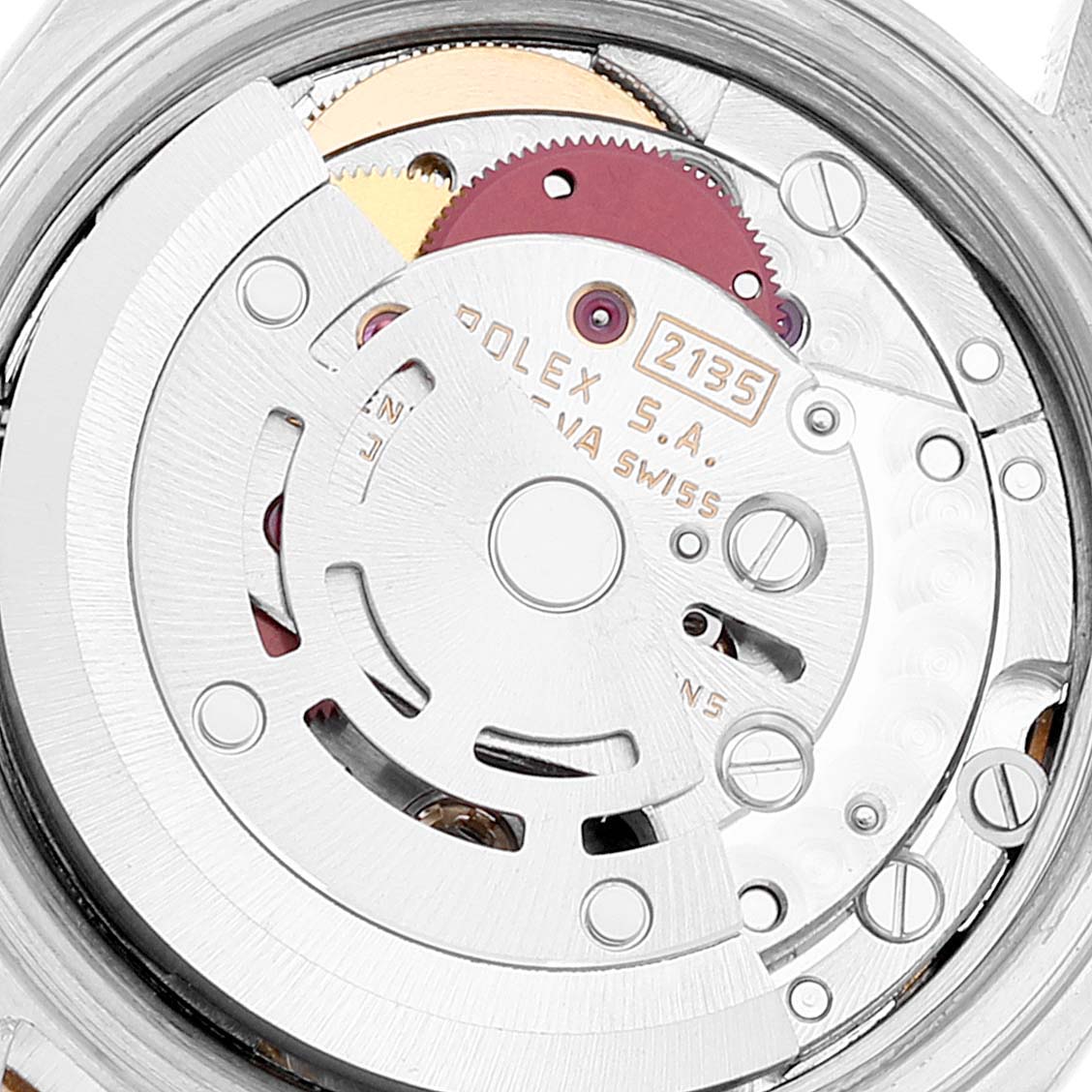This image shows a close-up of the movement mechanism inside a Rolex Datejust 69173 Women's Steel and Gold (two tone) Champagne Dial 69173 Women's Steel and Gold (two tone) Champagne Dial watch, specifically model 2135.