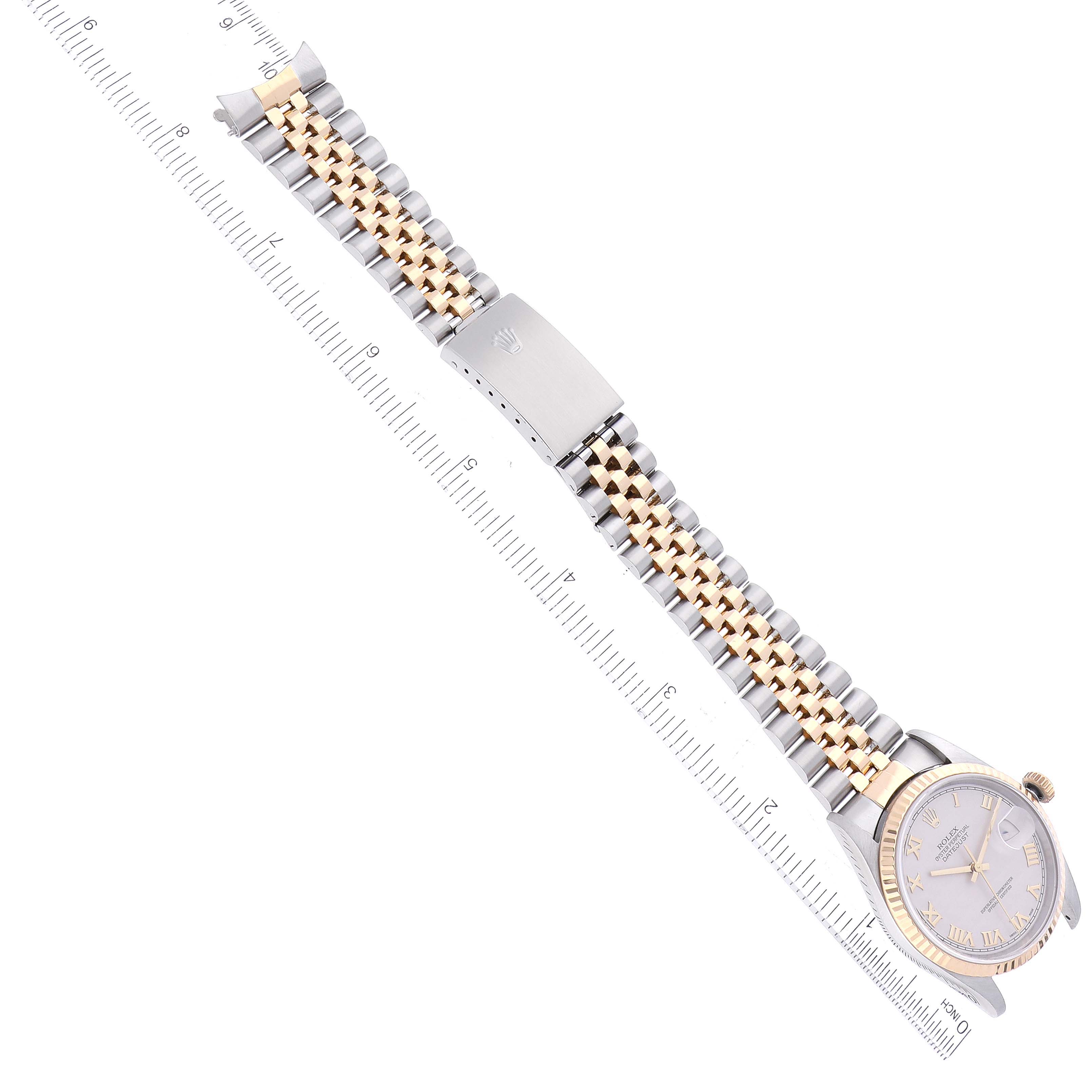 This image shows a top-down view of a Rolex Datejust 16233 Men's Steel and Gold (two tone) Beige Dial 16233 Men's Steel and Gold (two tone) Beige Dial watch, displaying its face, bezel, crown, and bracelet.