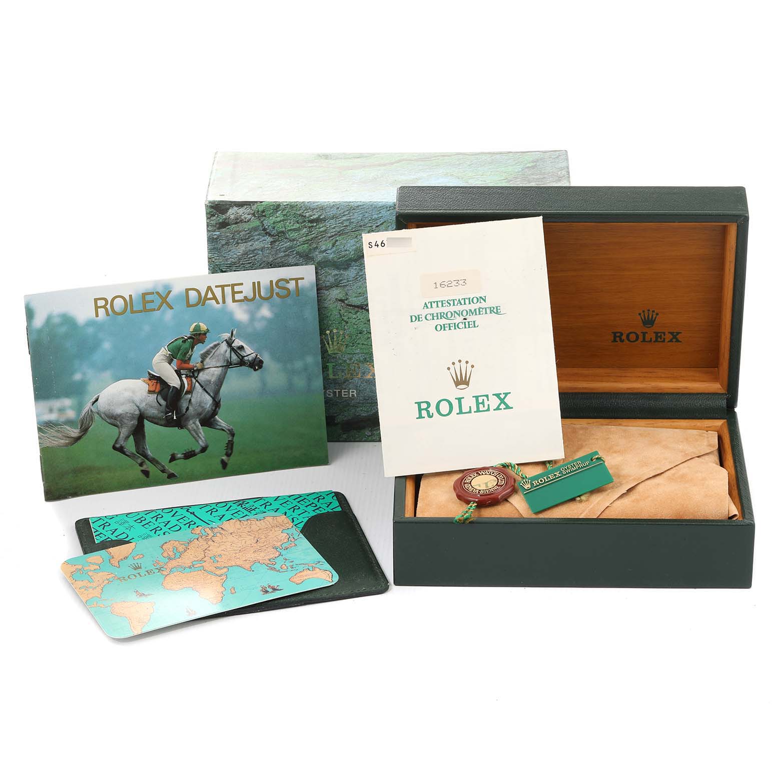 The image shows the accessories of a Rolex Datejust 16233 Men's Steel and Gold (two tone) White Dial 16233 Men's Steel and Gold (two tone) White Dial model, including the box, warranty, manual, and other documents.