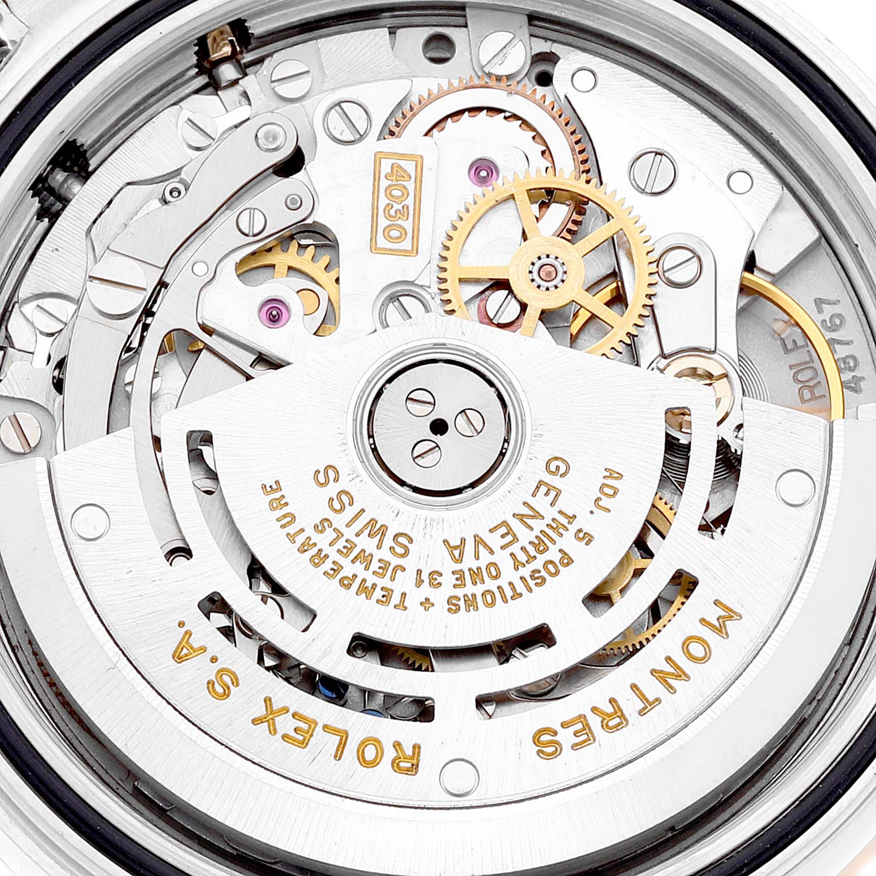 The image shows a close-up of the movement and inner mechanics of a Rolex Daytona 16523 Men's Steel and Gold (two tone) Black Dial 16523 Men's Steel and Gold (two tone) Black Dial watch.