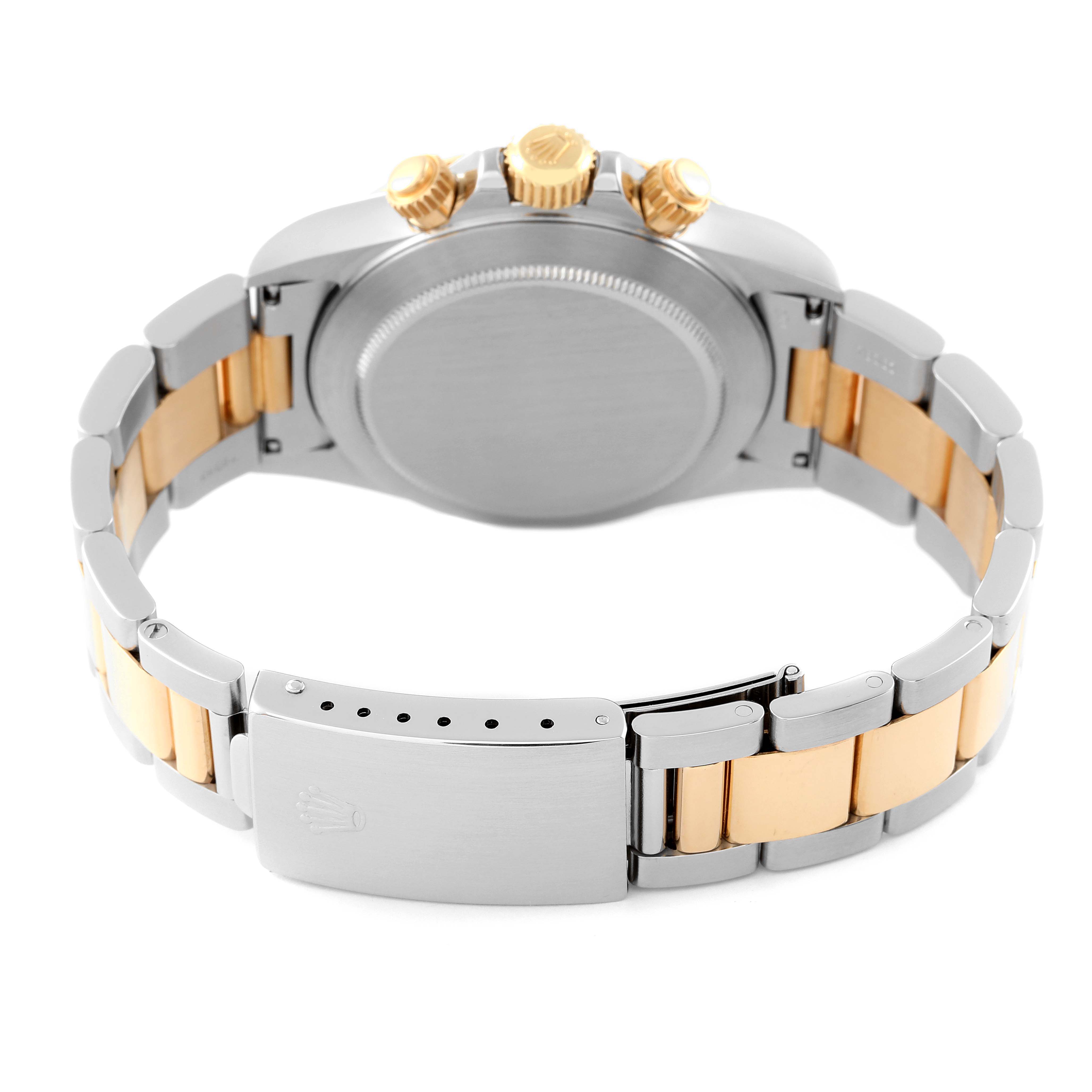 This image shows the back view of a Rolex Daytona 16523 Men's Steel and Gold (two tone) Black Dial 16523 Men's Steel and Gold (two tone) Black Dial watch, highlighting its case, crown, and two-tone bracelet with a clasp.