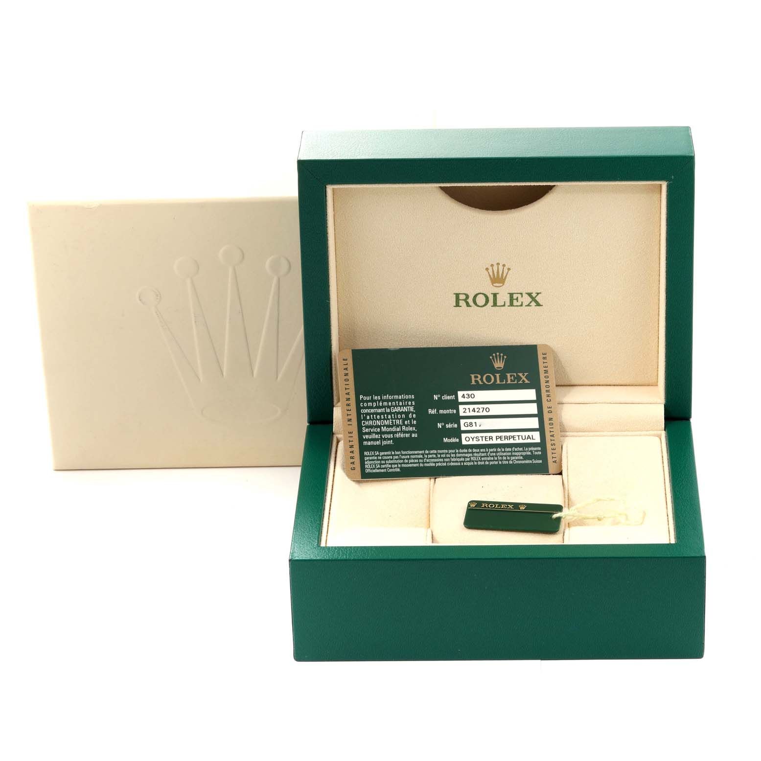 The image shows the packaging and warranty card for a Rolex Explorer 214270 Men
s Stainless Steel Black Dial 214270 Men
s Stainless Steel Black Dial watch, with the box open and label visible.