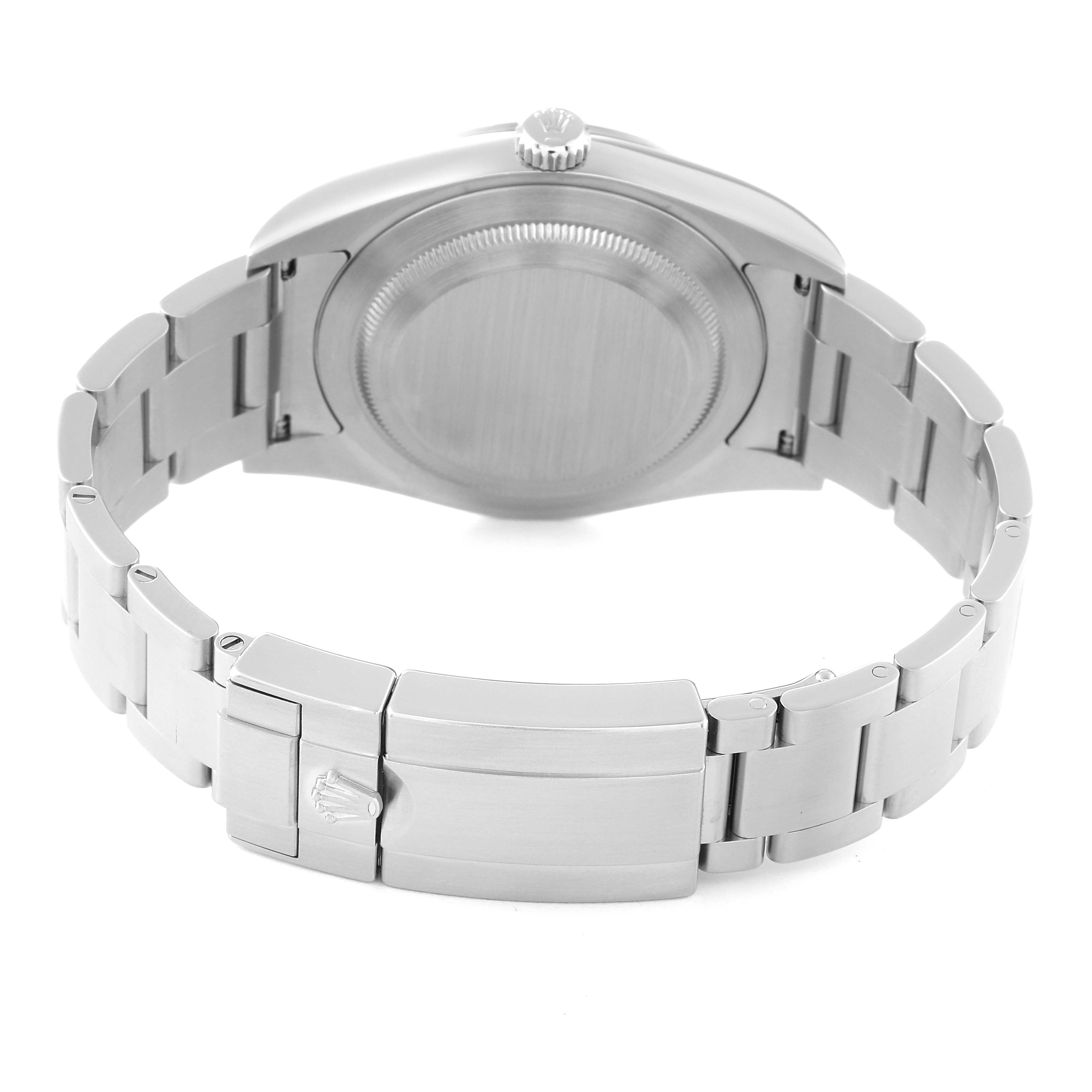 The image shows the back view of a Rolex Explorer 214270 Men
s Stainless Steel Black Dial 214270 Men
s Stainless Steel Black Dial watch, displaying the case back and the closed clasp of the bracelet.