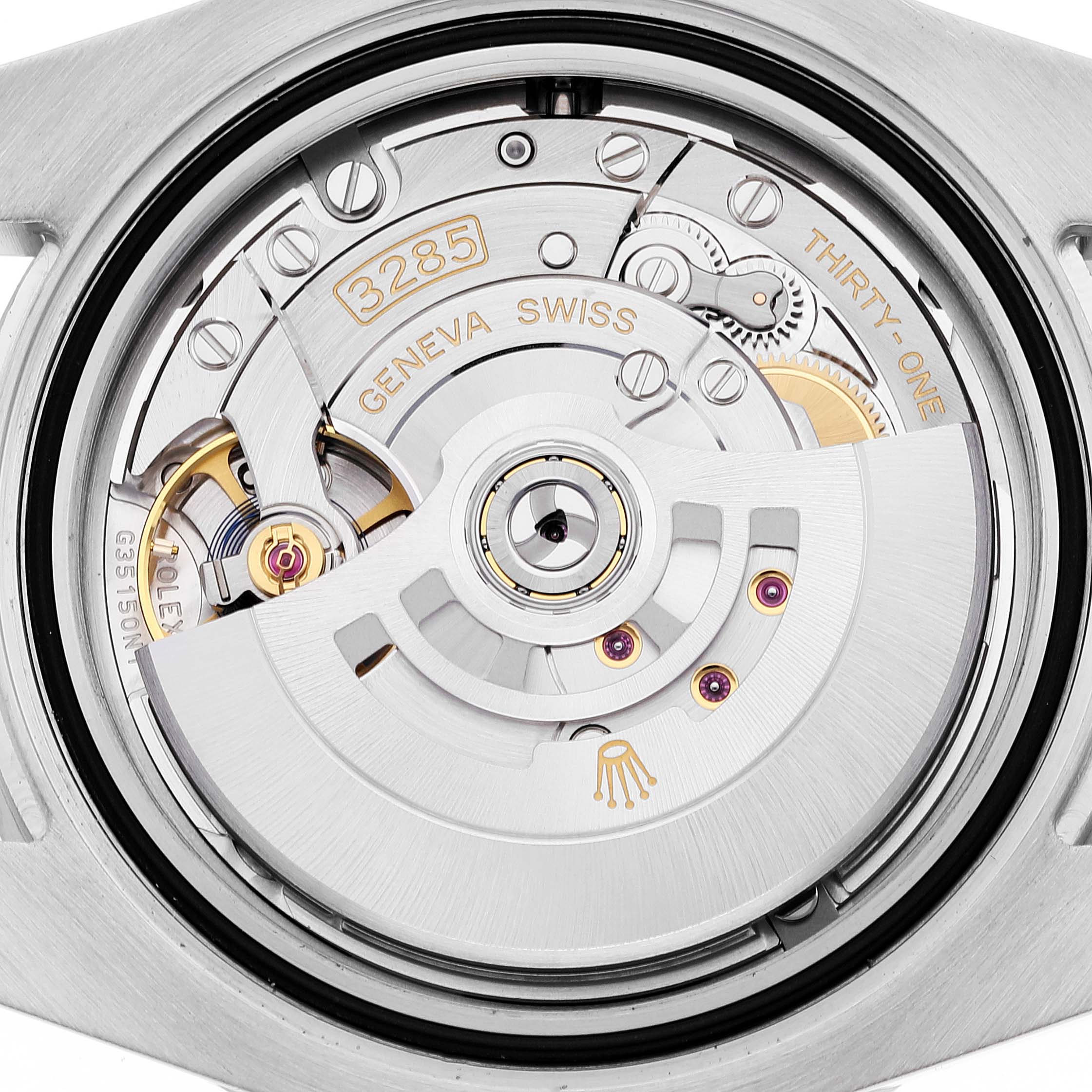The image shows a close-up of the movement mechanism, specifically the caliber 3285, of a Rolex GMT-Master 126710 Men
s Stainless Steel Black Dial 126710 Men
s Stainless Steel Black Dial watch.