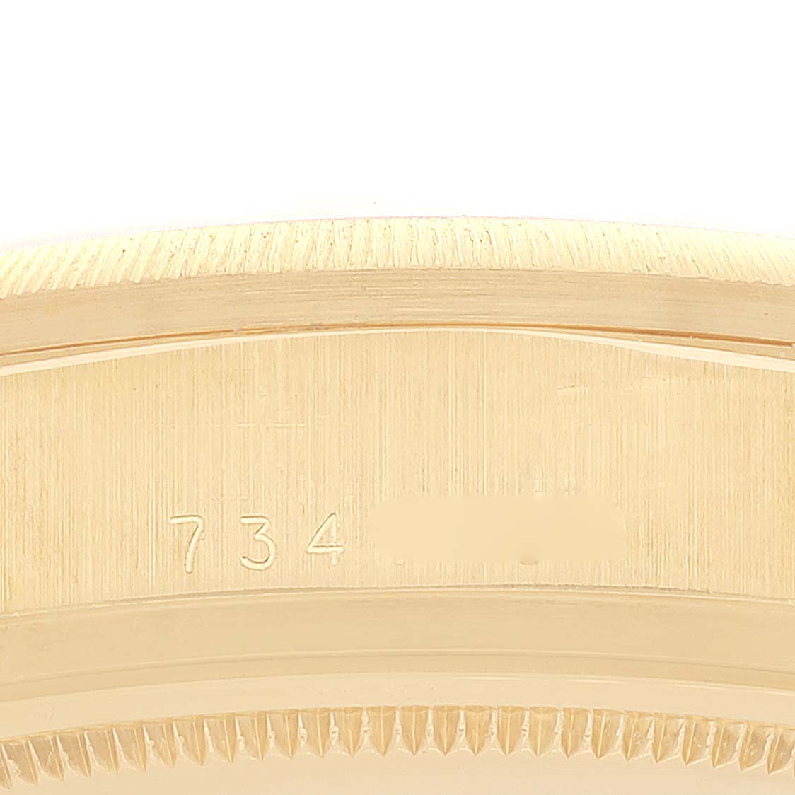 The image shows a close-up of the side of the bezel and case of a Rolex President 18078 Men
s Yellow Gold Champagne Dial 18078 Men
s Yellow Gold Champagne Dial model watch.