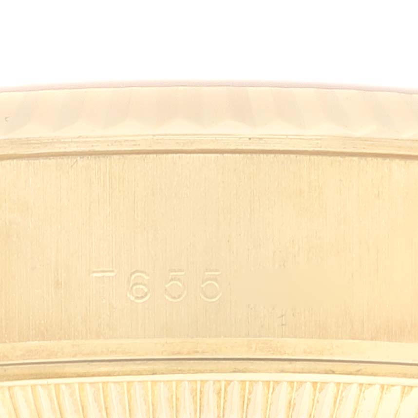 This image shows a close-up of the caseback edge of a Rolex President 69178 Women's Yellow Gold Champagne Dial 69178 Women's Yellow Gold Champagne Dial model, highlighting the model number engraving.