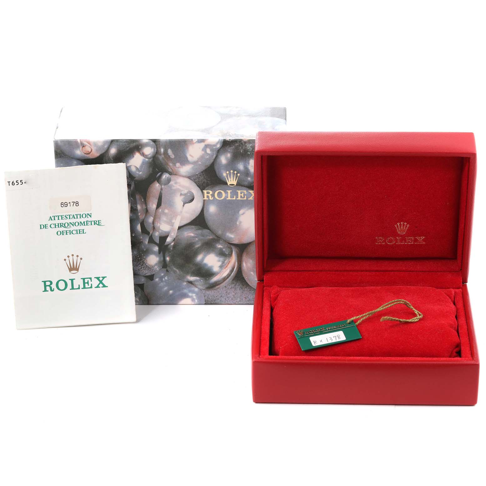 The image shows the packaging and accessories for a Rolex President 69178 Women's Yellow Gold Champagne Dial 69178 Women's Yellow Gold Champagne Dial model, including a box, certificate, and tag.