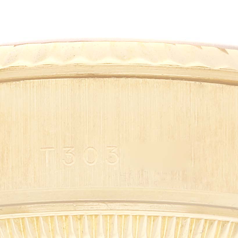 This is a close-up of the case side showing the engraving on the Rolex President 69178 Women
s Yellow Gold Champagne Dial 69178 Women
s Yellow Gold Champagne Dial model watch.