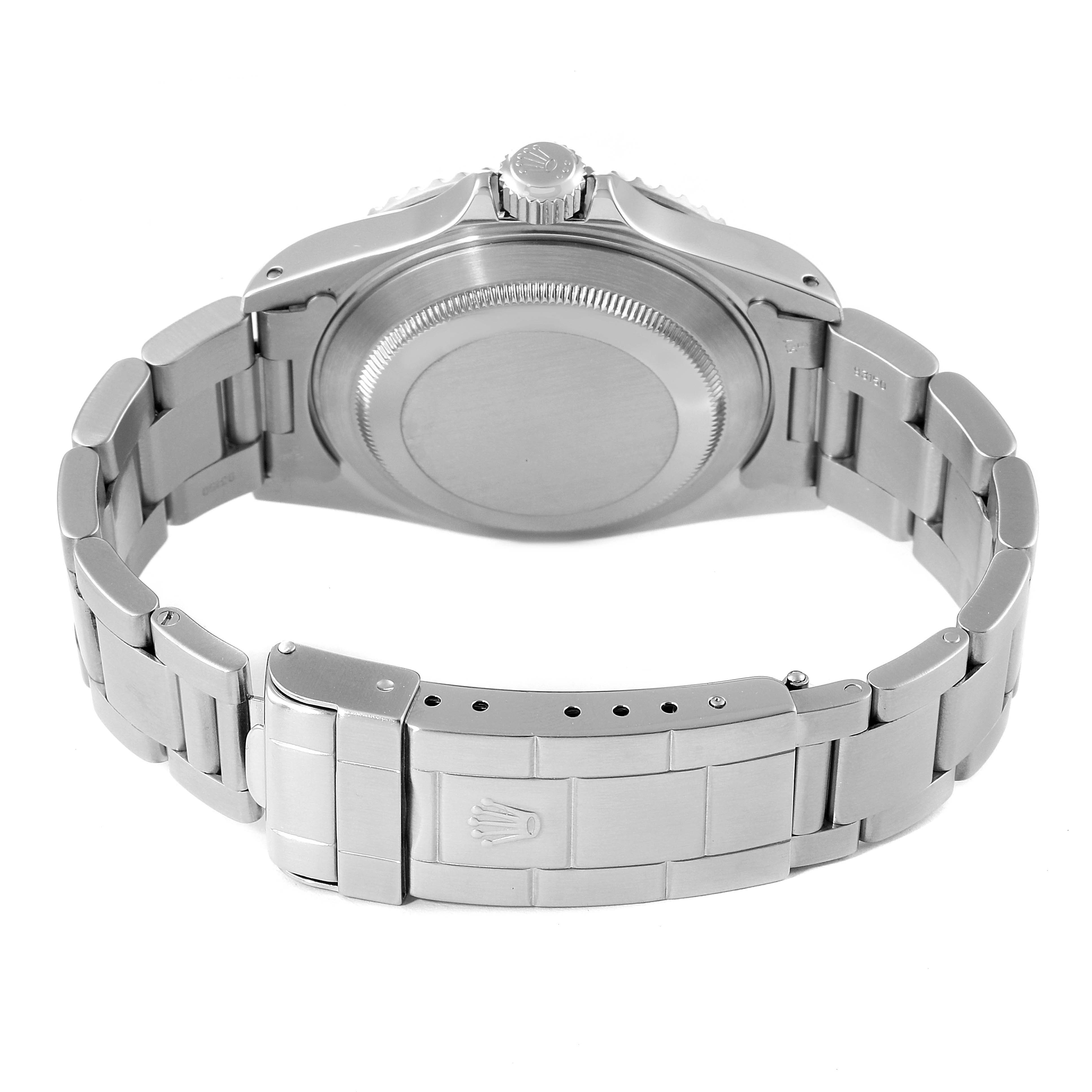 The image shows the back view of a Rolex Submariner 14060 Men
s Stainless Steel Black Dial 14060 Men
s Stainless Steel Black Dial watch, highlighting its case back, bracelet, and clasp.