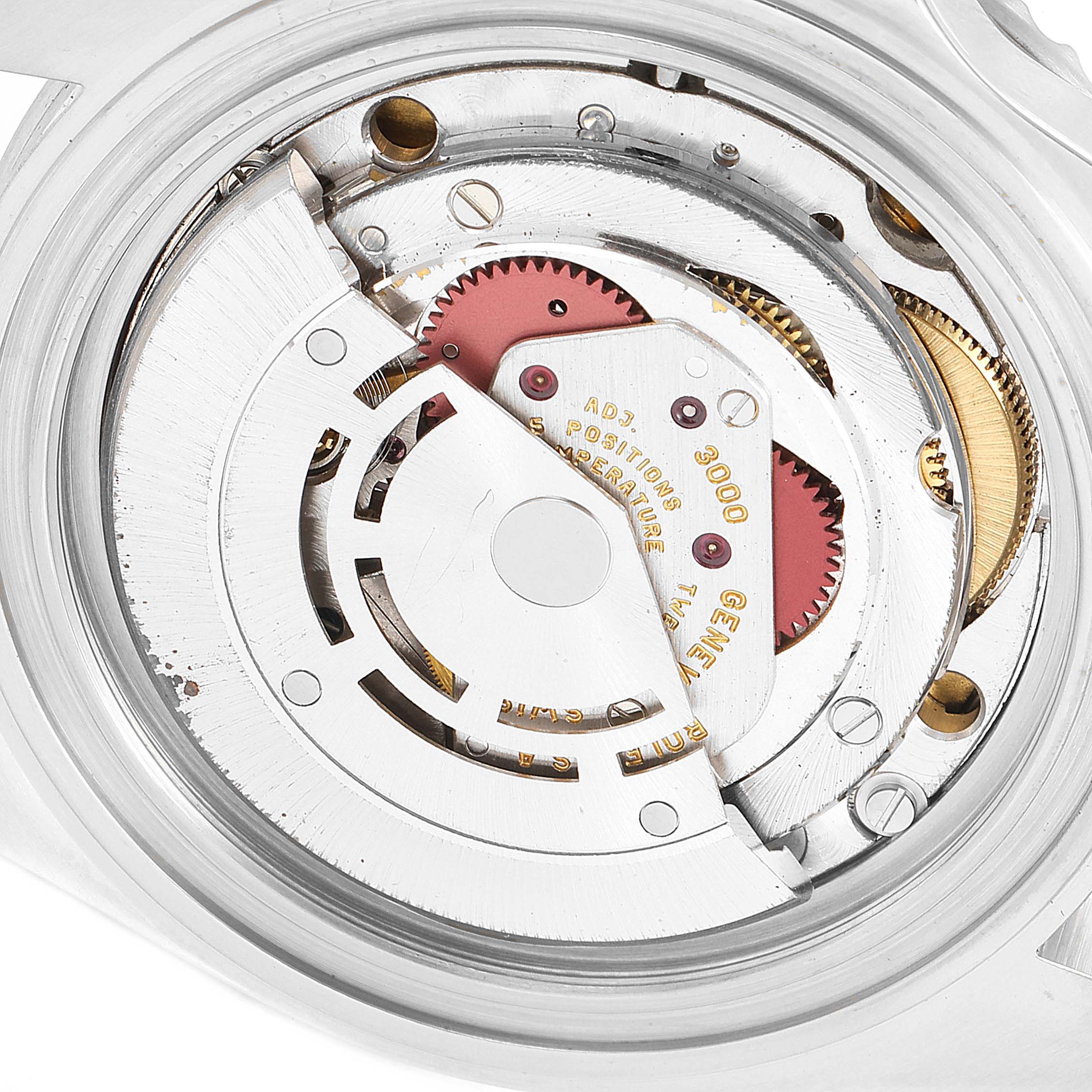 This image shows the movement mechanism of the Rolex Submariner 14060 Men
s Stainless Steel Black Dial 14060 Men
s Stainless Steel Black Dial watch from a top-down angle.