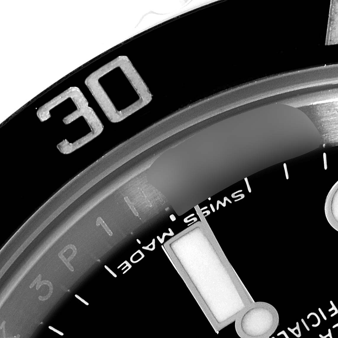 The image shows a close-up of the bezel and dial of a Rolex Submariner 116610 Men
s Stainless Steel Black Dial 116610 Men
s Stainless Steel Black Dial watch, focusing on the 30-minute mark.