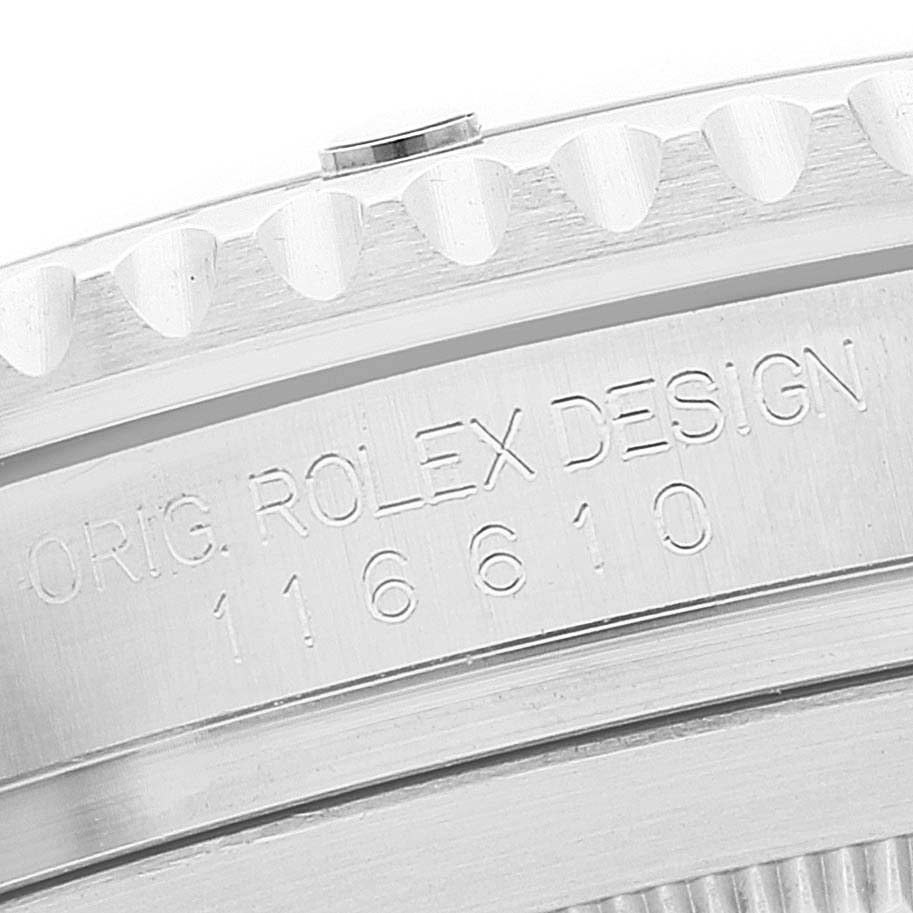 The image shows a close-up of the engraved case side of a Rolex Submariner 116610 Men's Stainless Steel Black Dial 116610 Men's Stainless Steel Black Dial watch, model number 116610.