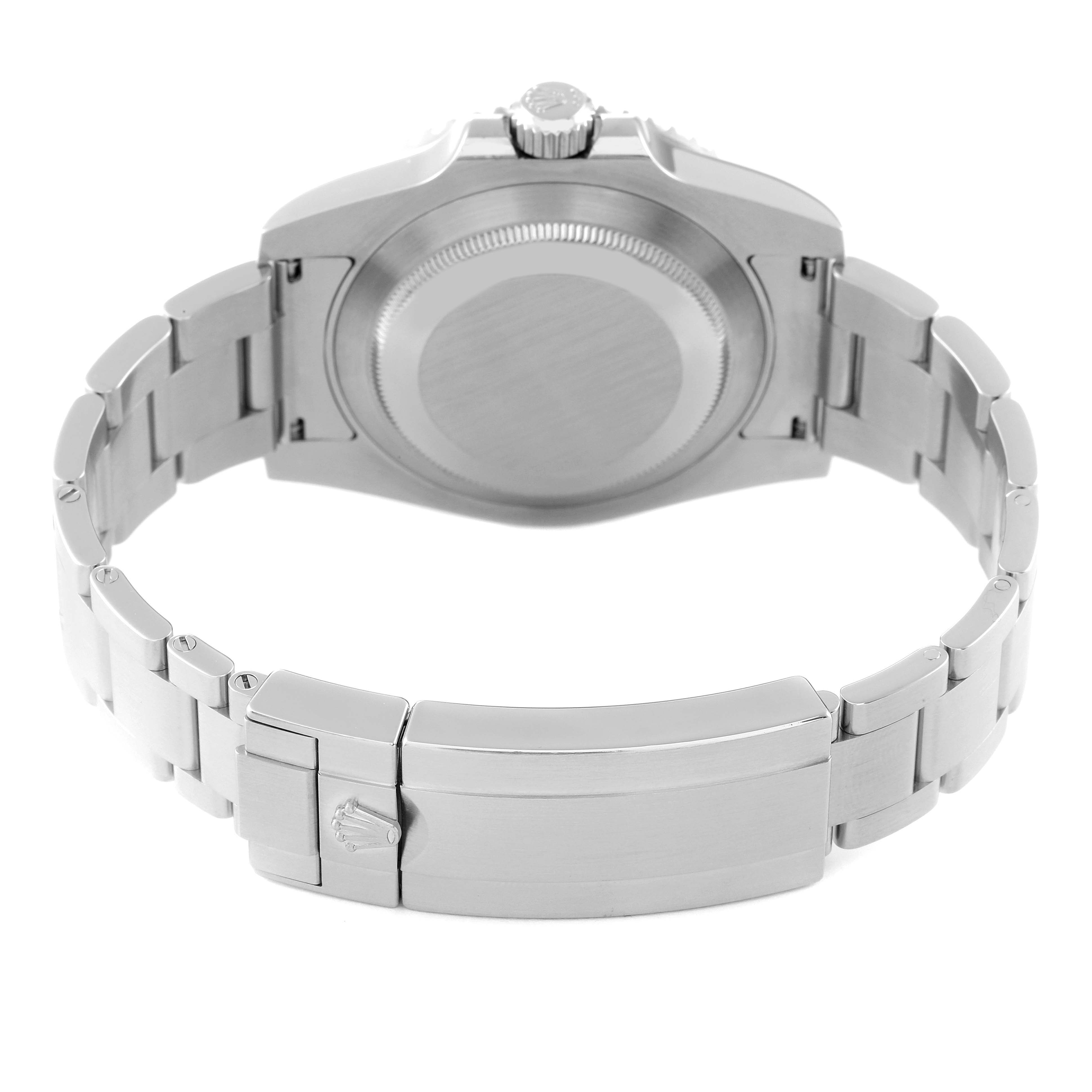 The image shows the backside of a Rolex Submariner 116610 Men
s Stainless Steel Black Dial 116610 Men
s Stainless Steel Black Dial, highlighting the case back and the metal bracelet clasp.