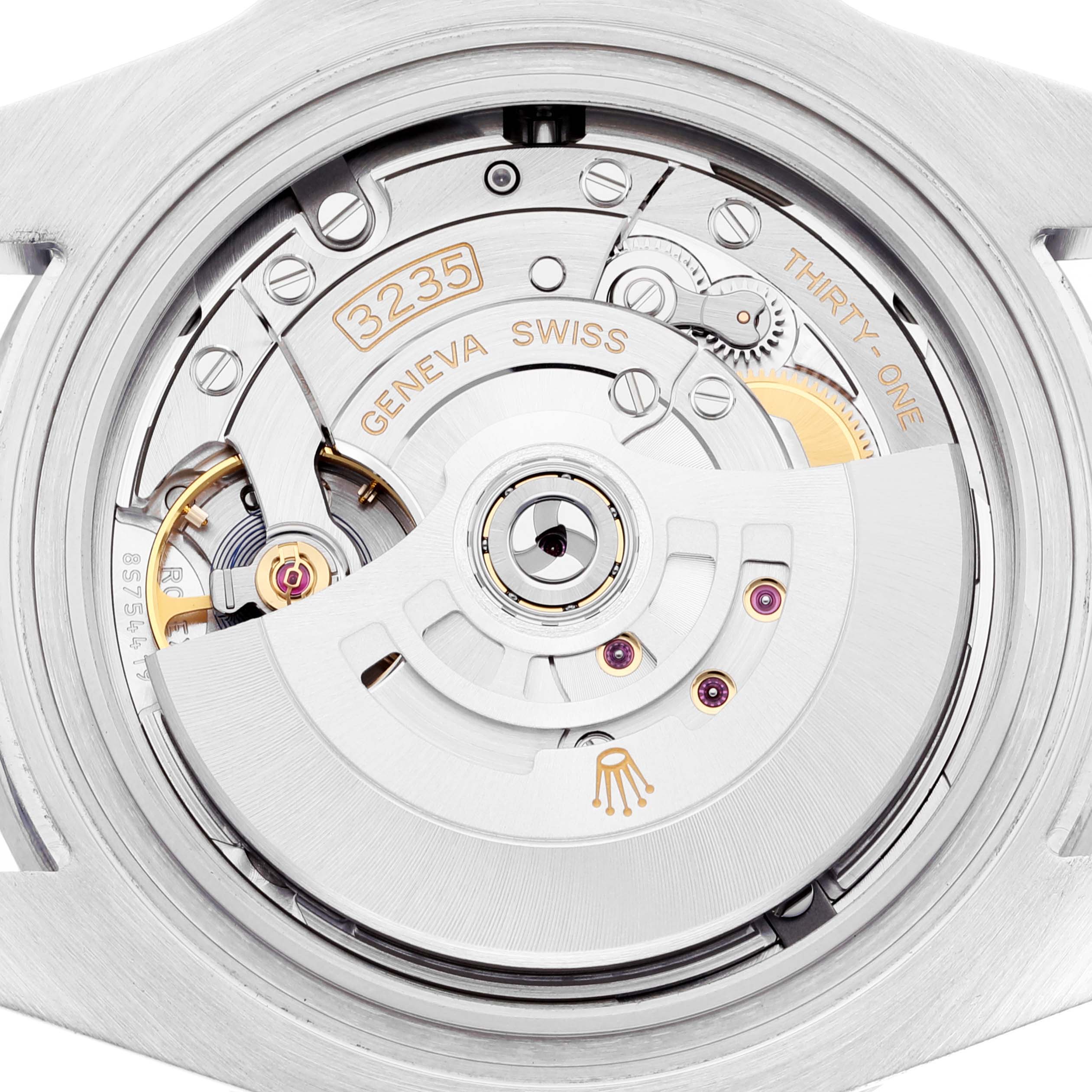 This image shows the movement and internal mechanism of a Rolex Submariner 126610 Men
s Stainless Steel Black Dial 126610 Men
s Stainless Steel Black Dial model, highlighting the intricate components and engravings.