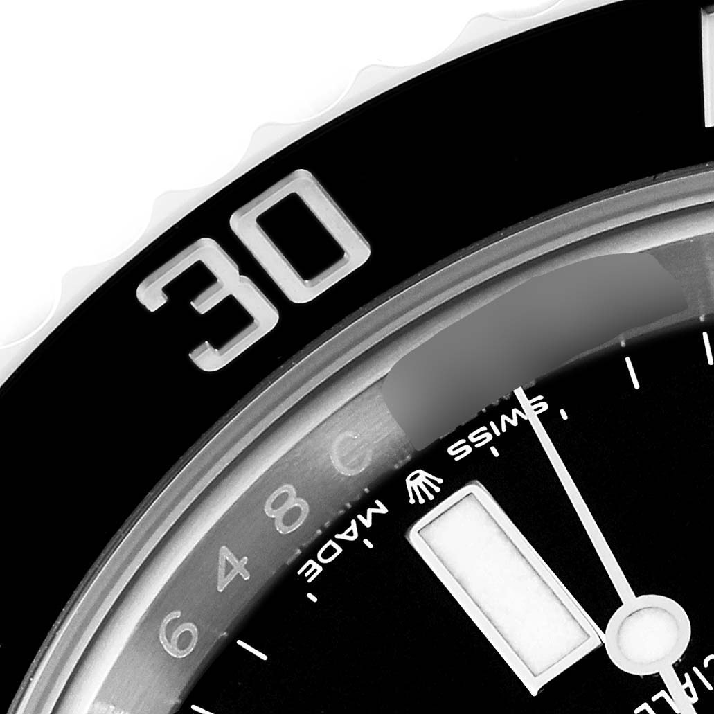 The close-up image shows the bezel and a part of the dial of the Rolex Submariner 126610 Men
s Stainless Steel Black Dial 126610 Men
s Stainless Steel Black Dial watch.