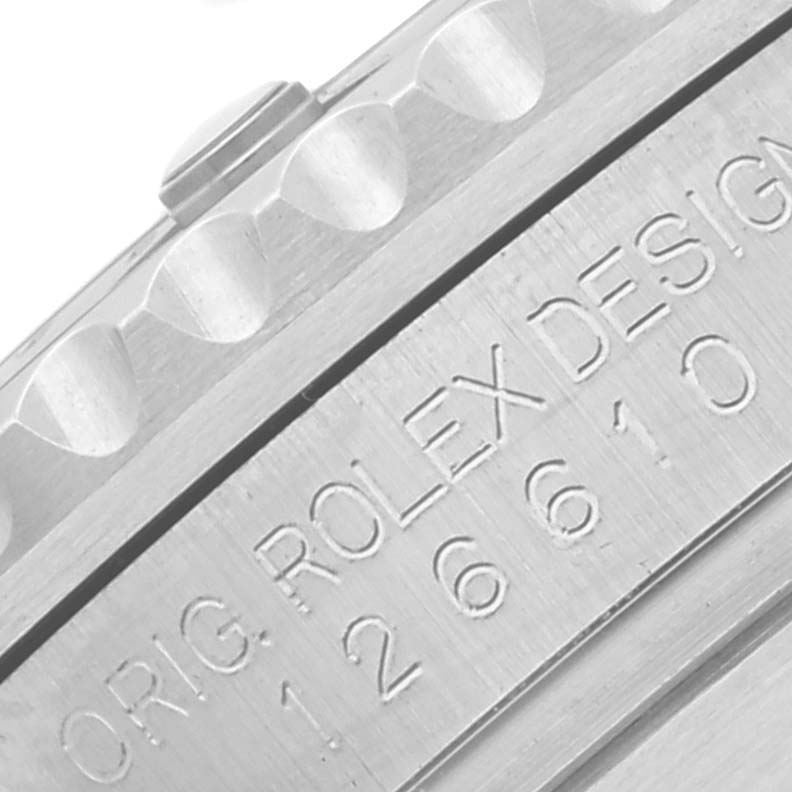 This close-up image shows the engravings on the side of the bezel of a Rolex Submariner 126610 Men
s Stainless Steel Black Dial 126610 Men
s Stainless Steel Black Dial watch.