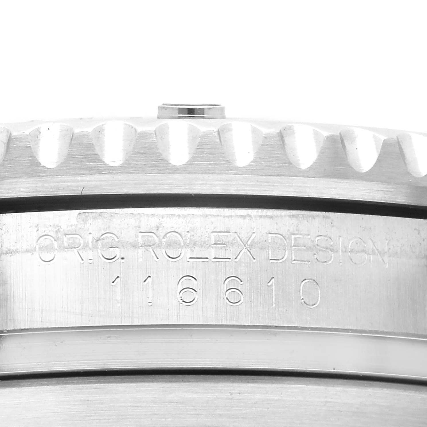 This image shows the side of the bezel and case of a Rolex Submariner 116610LV Men's Stainless Steel Green Dial 116610LV Men's Stainless Steel Green Dial, highlighting the engraved model number 116610.