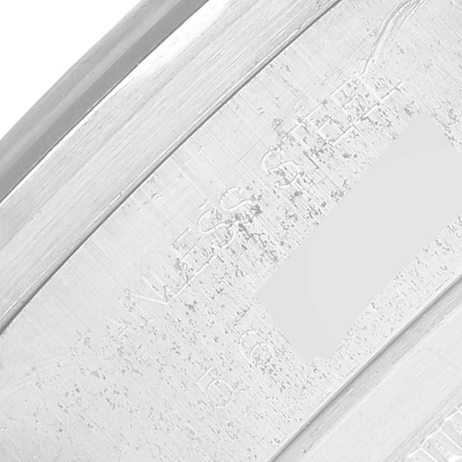 This image shows a close-up of the engravings on the caseback edge of a Tudor Prince 79160 Men's Stainless Steel Silver Dial 79160 Men's Stainless Steel Silver Dial model watch.