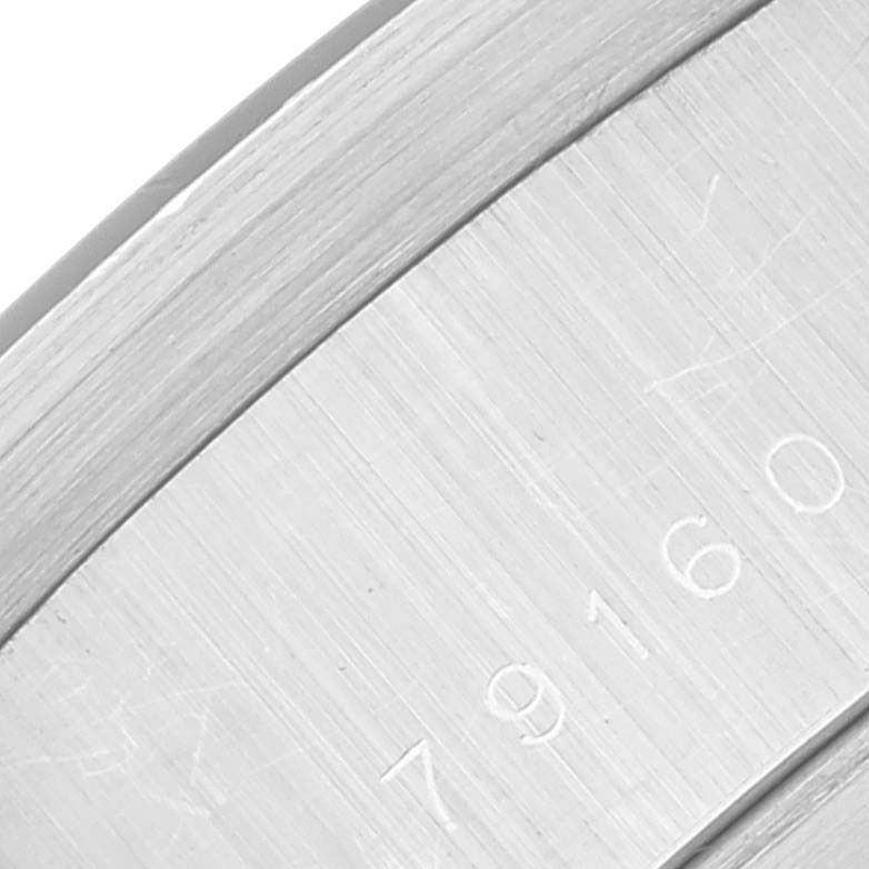 This image shows a close-up angle of the case back with the engraved reference number of a Tudor Prince 79160 Men's Stainless Steel Silver Dial 79160 Men's Stainless Steel Silver Dial model watch.
