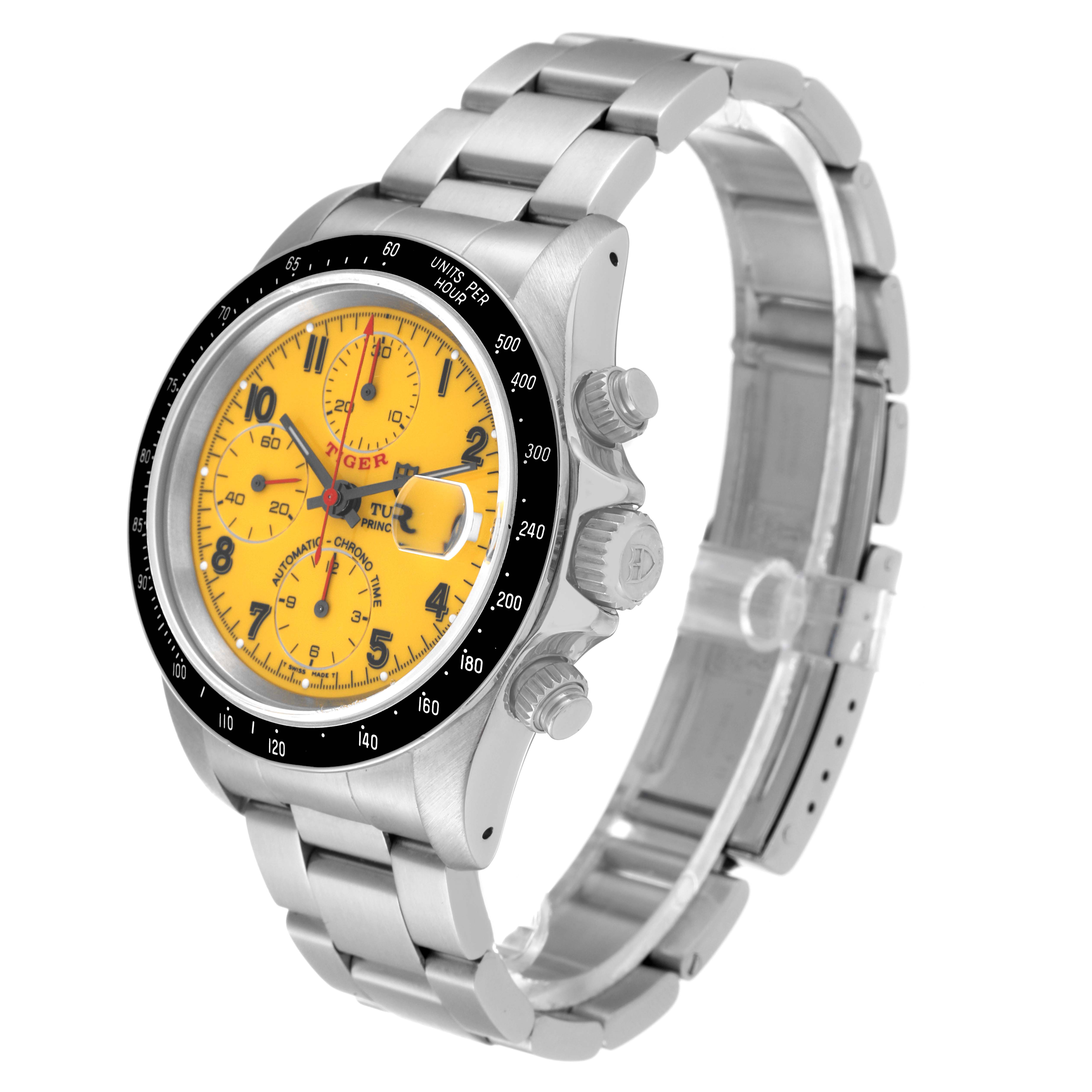 The Tudor Prince model watch is shown at an angle highlighting its yellow dial, bezel, crown, and stainless steel bracelet.