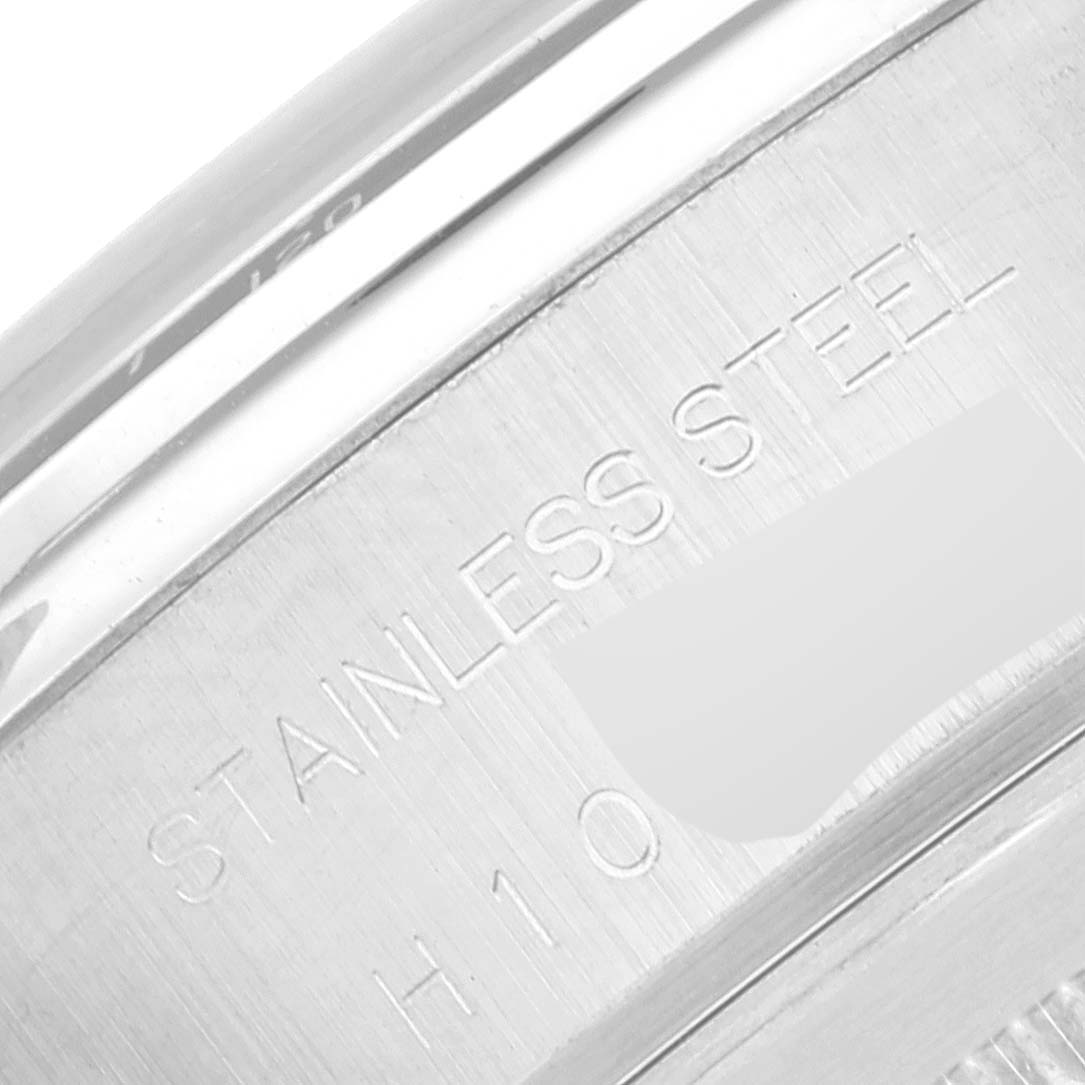 This close-up image shows the engraved stainless steel casing of the Tudor Prince watch.
