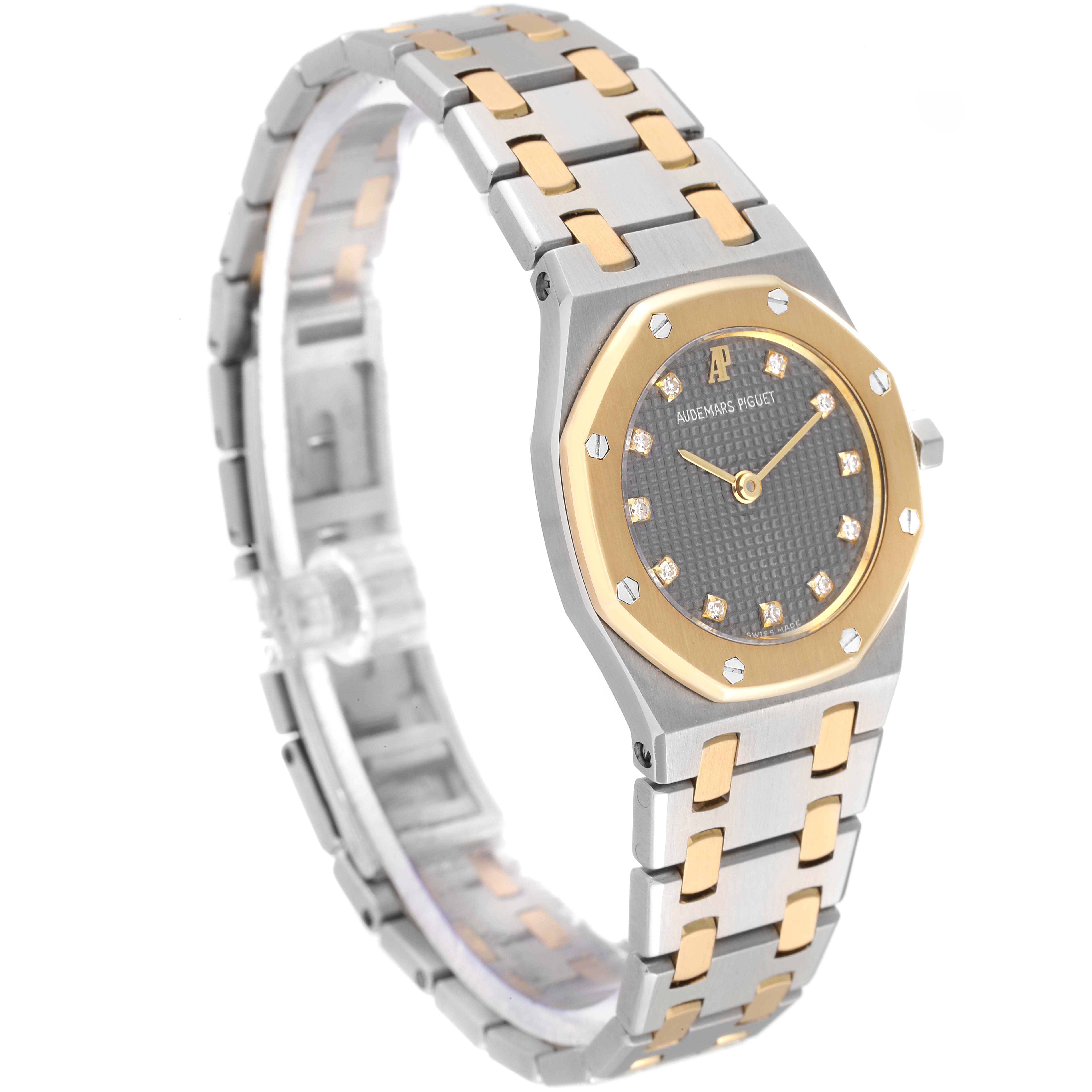 The image shows a front-side angle of a Royal Oak model by Audemars Piguet, highlighting the bezel, dial, and bracelet.