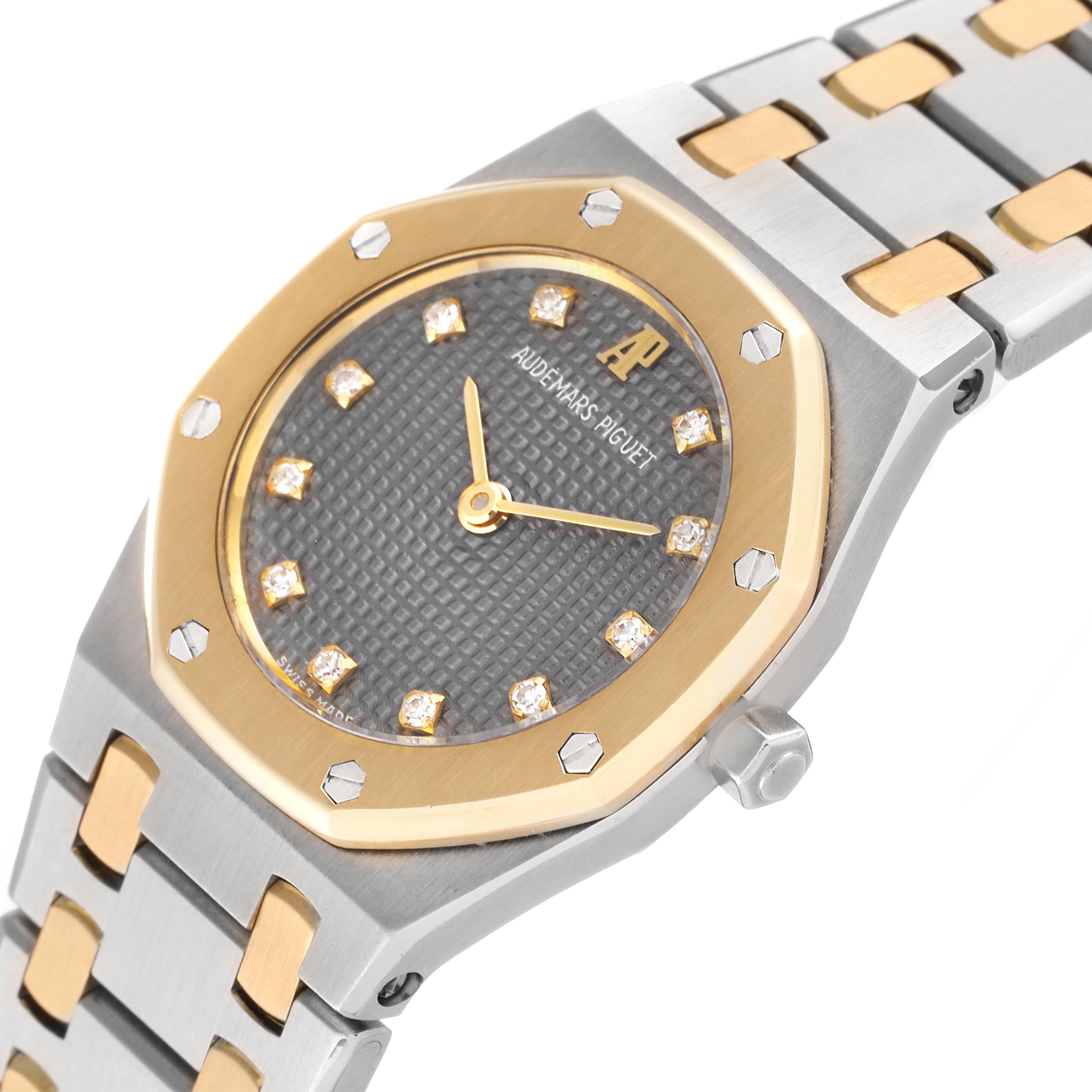 The Audemars Piguet Royal Oak N1553 Women's Steel and Gold (two tone) Grey Dial N1553 Women's Steel and Gold (two tone) Grey Dial watch is displayed at an angled view, showcasing the dial, bezel, and part of the bracelet.