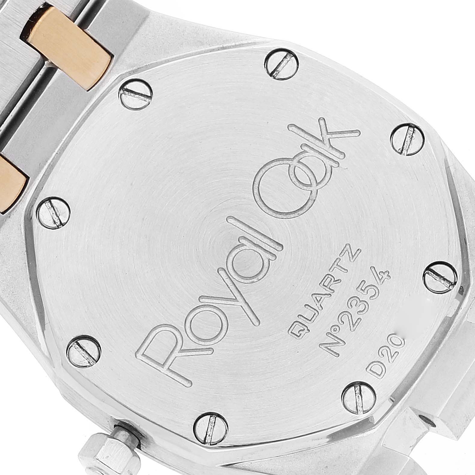 The image shows the case back of a Royal Oak Quartz model by Audemars Piguet from a close-up angle.