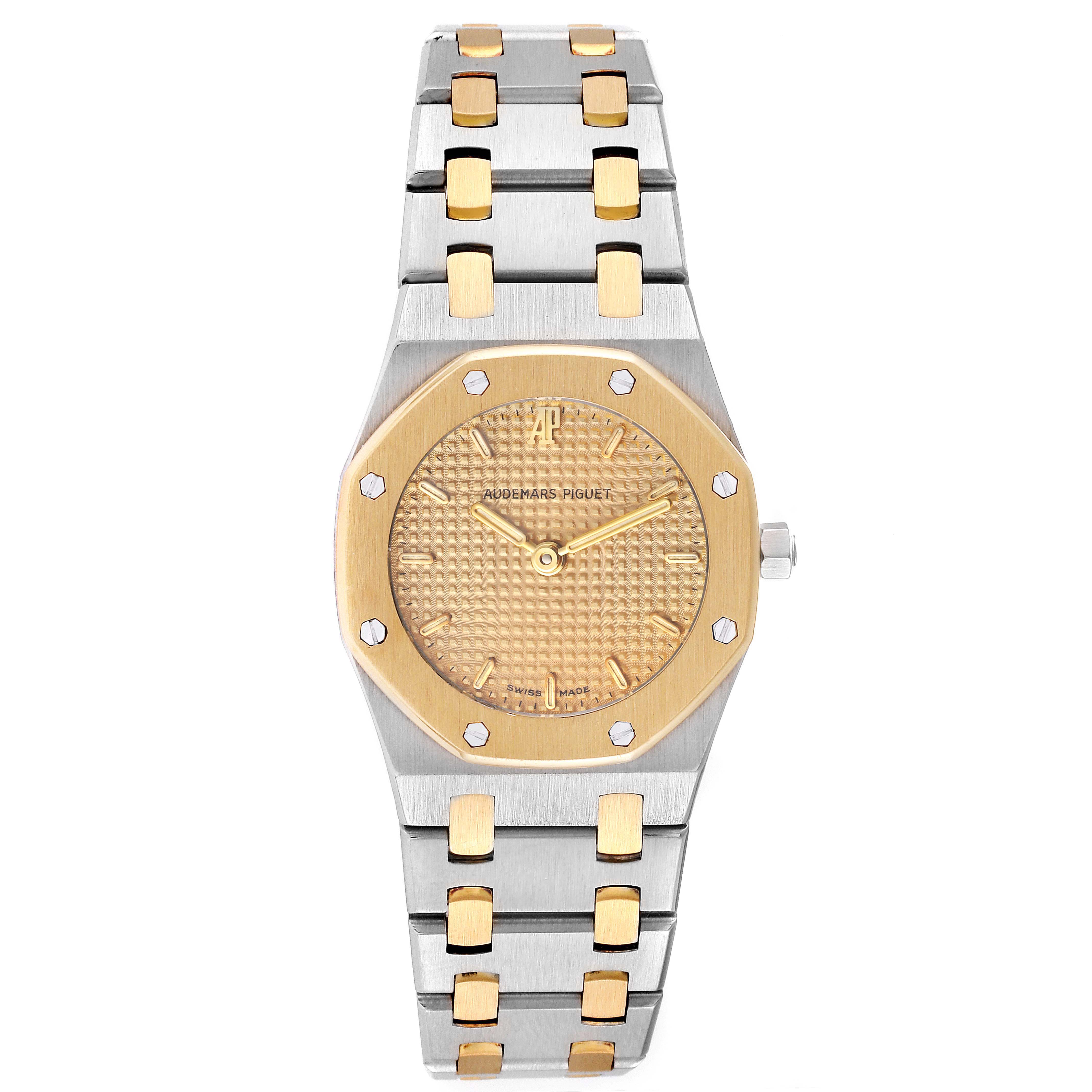 The image shows a front view of the Audemars Piguet Royal Oak N2354 Women's Steel and Gold (two tone) Champagne Dial N2354 Women's Steel and Gold (two tone) Champagne Dial watch, highlighting its dial, bezel, and bracelet.