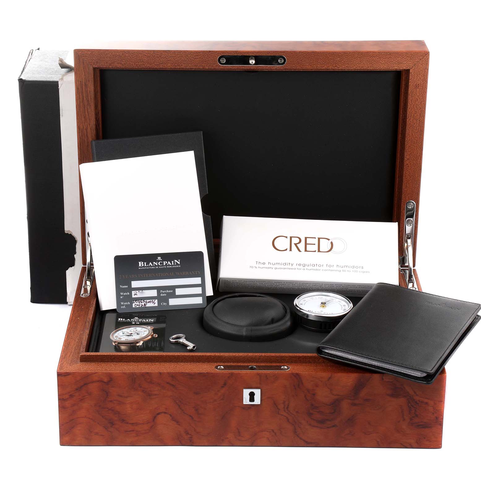 The image shows a Villeret model watch by Blancpain, presented in an open box with accessories like a wallet, manual, and warranty card.