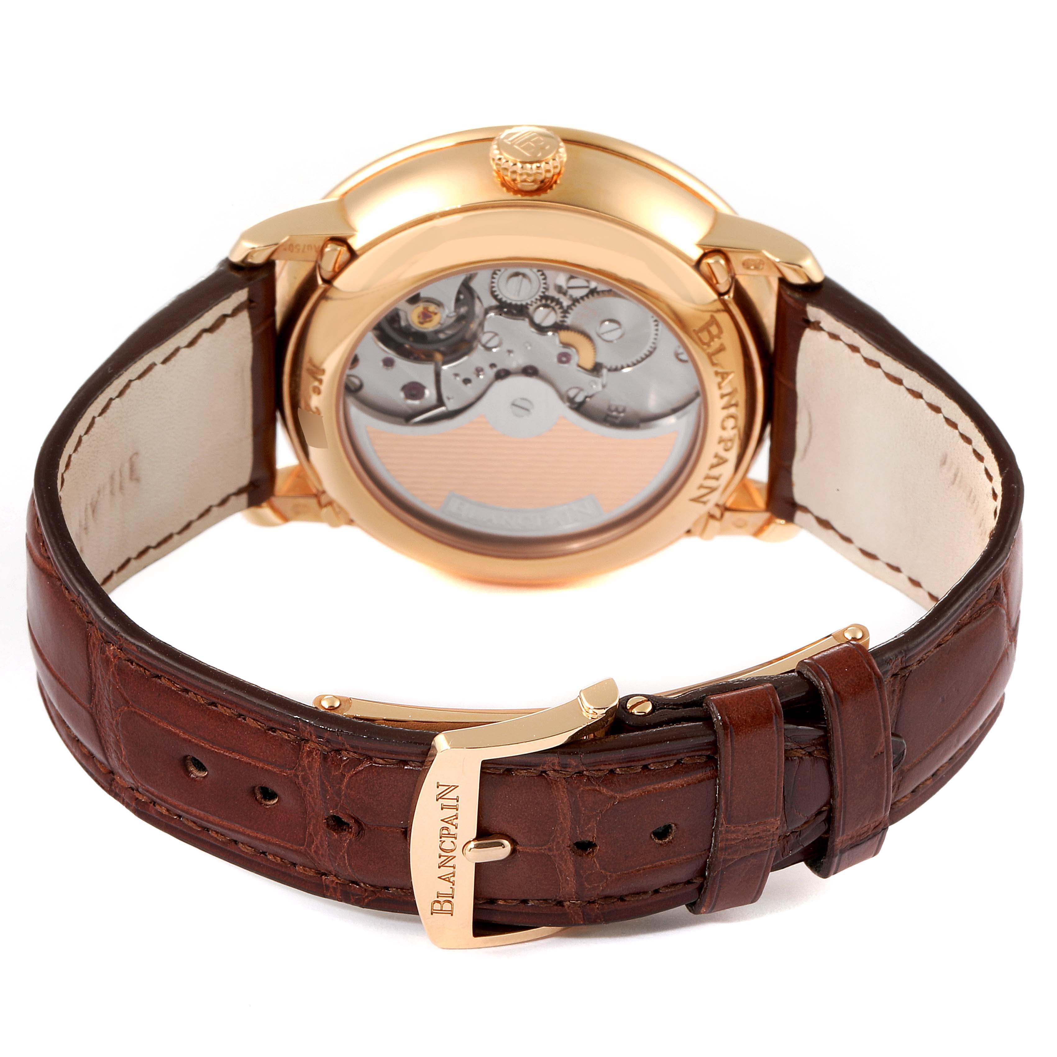 The image shows the back view of a Villeret model by Blancpain, highlighting the watch's exposed movement and leather strap with a Blancpain clasp.