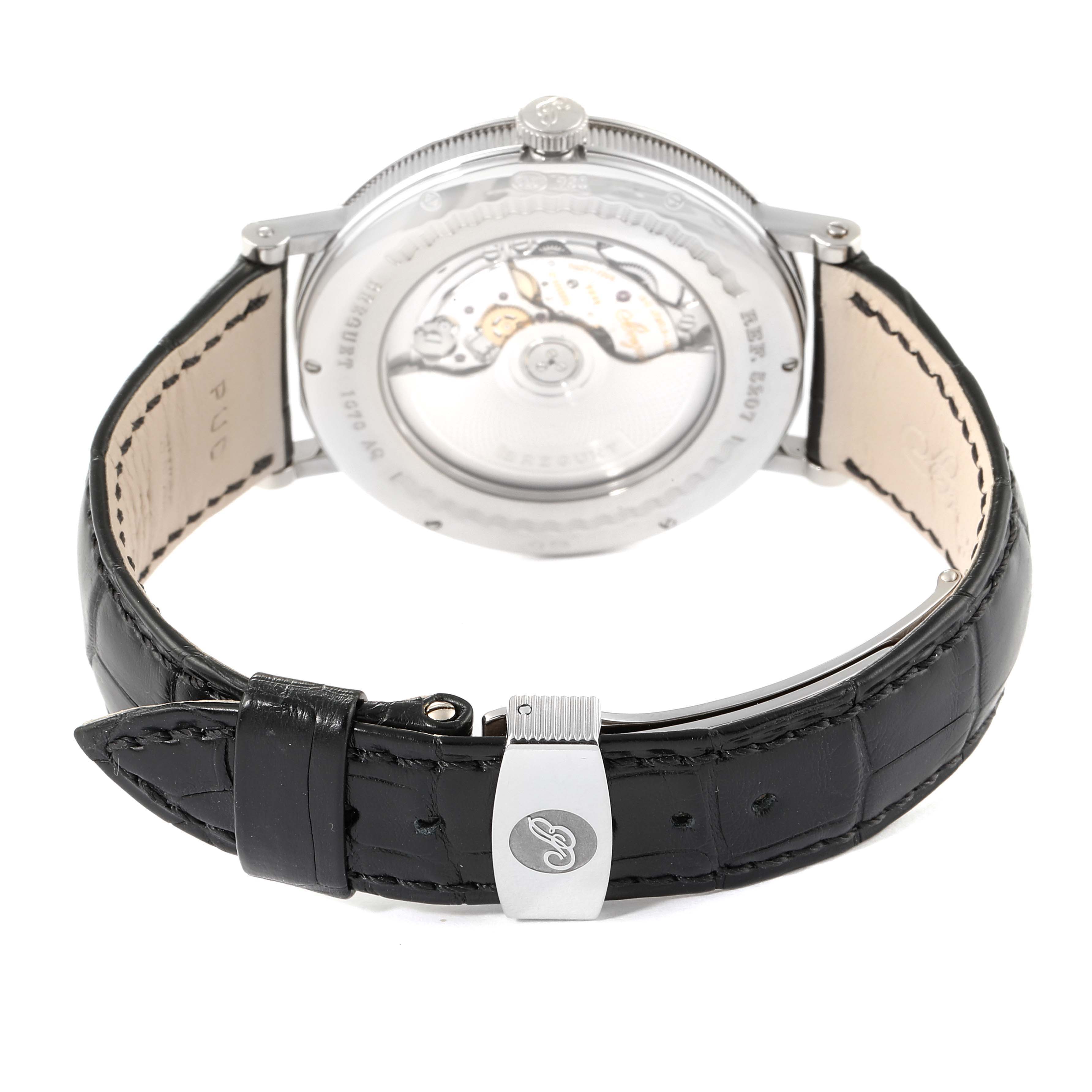 This image shows the back view of the Breguet Classique 5207BB/12/9V6 Men's Stainless Steel Silver Dial 5207BB/12/9V6 Men's Stainless Steel Silver Dial watch, highlighting its movement and black leather strap.