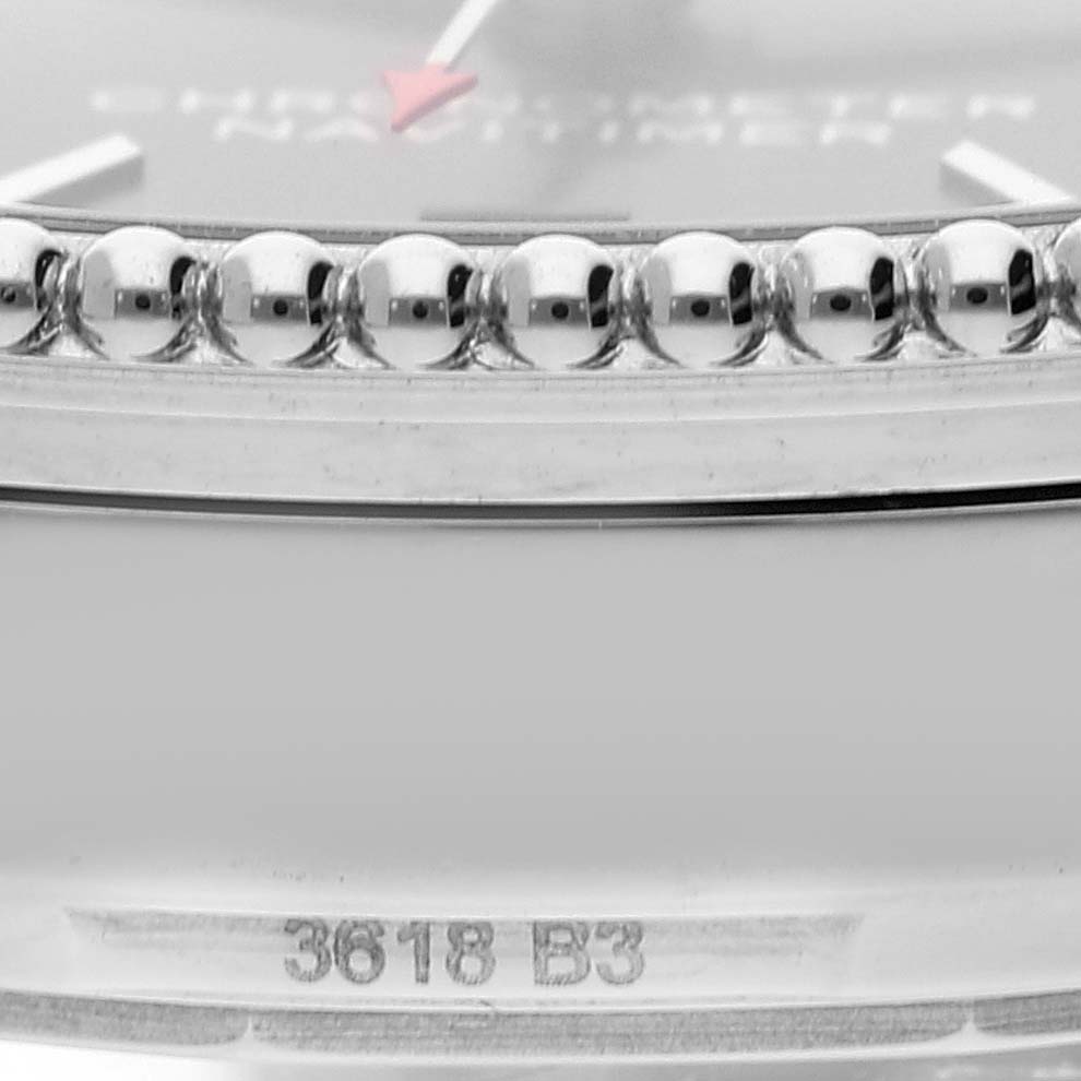 This close-up image of the Breitling Navitimer A17325 Men's Stainless Steel Black Dial A17325 Men's Stainless Steel Black Dial showcases the edge of the dial and bezel with a partial view of the model number.