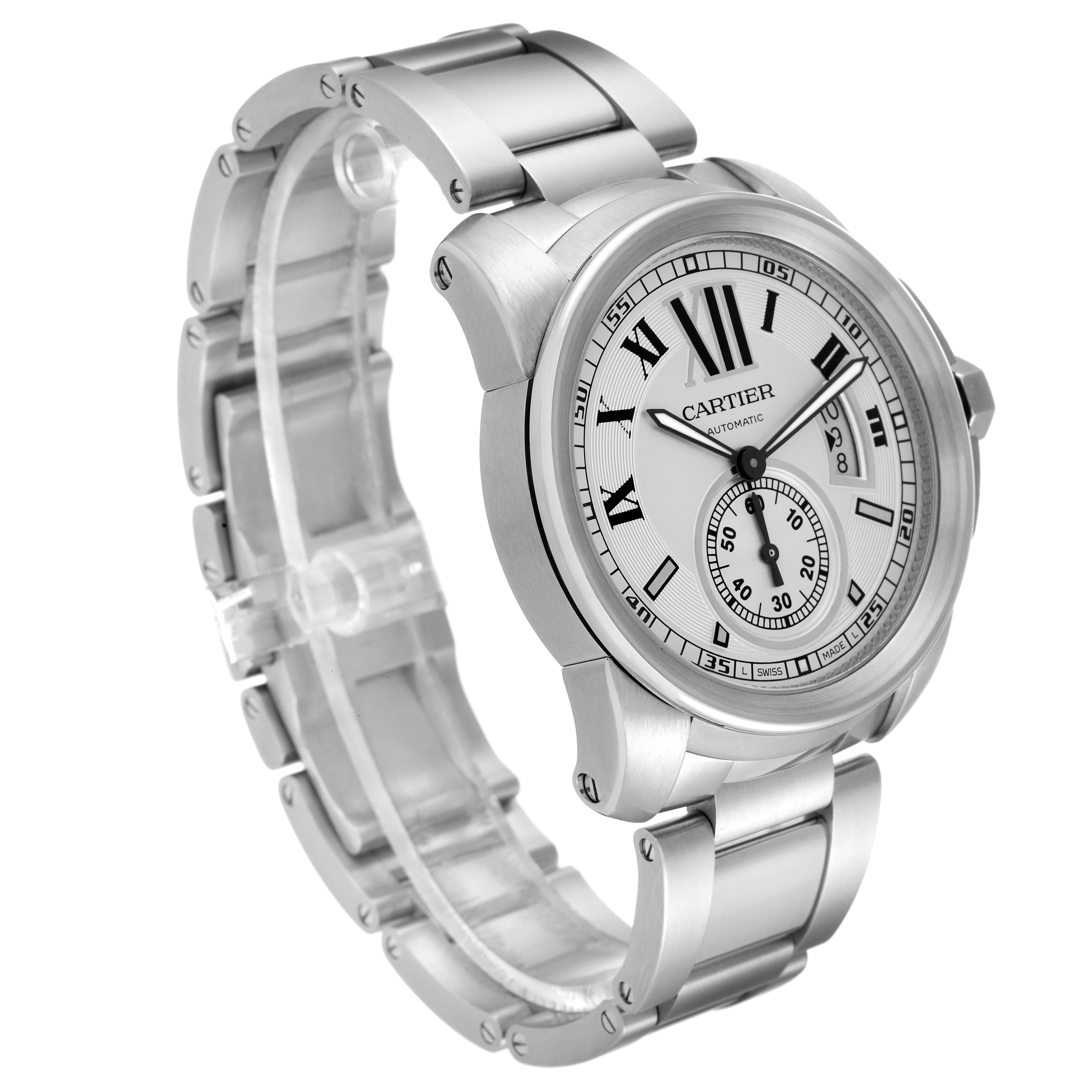 The image shows a Calibre de Cartier watch by Cartier, angled to display its face, bezel, and metal bracelet.